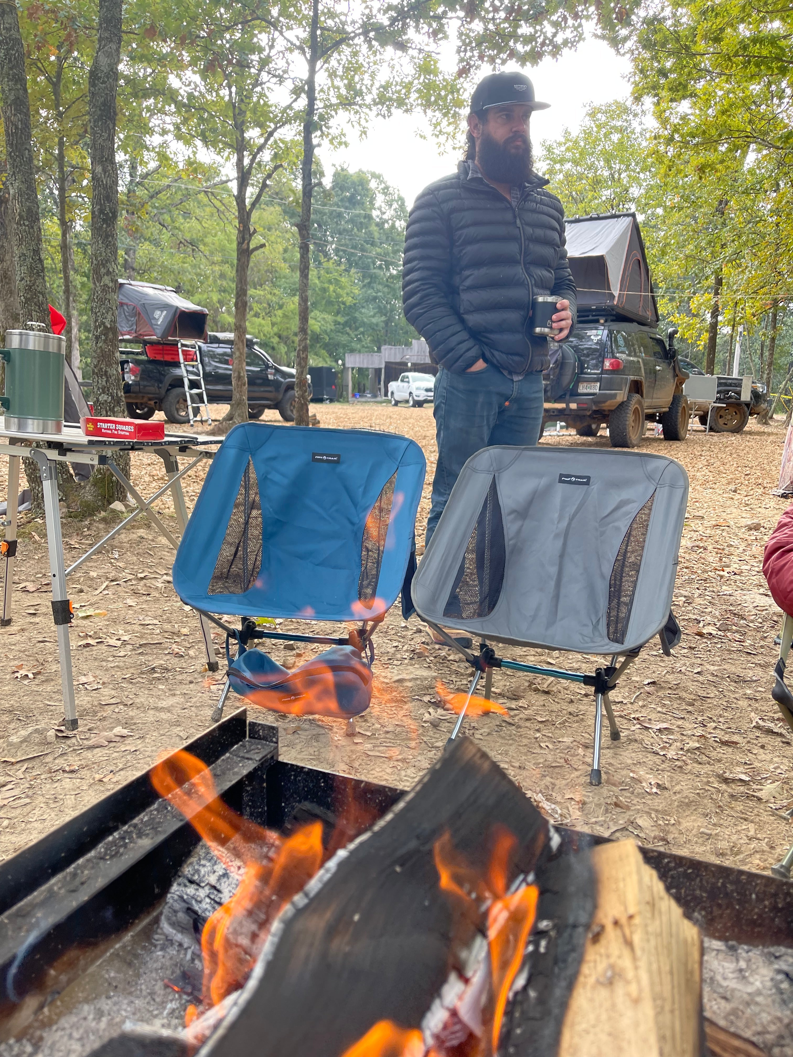 Pike Trail ultralight compact outdoor camping and beach tailgate festival chair, foldable with armrests and sturdy frame.