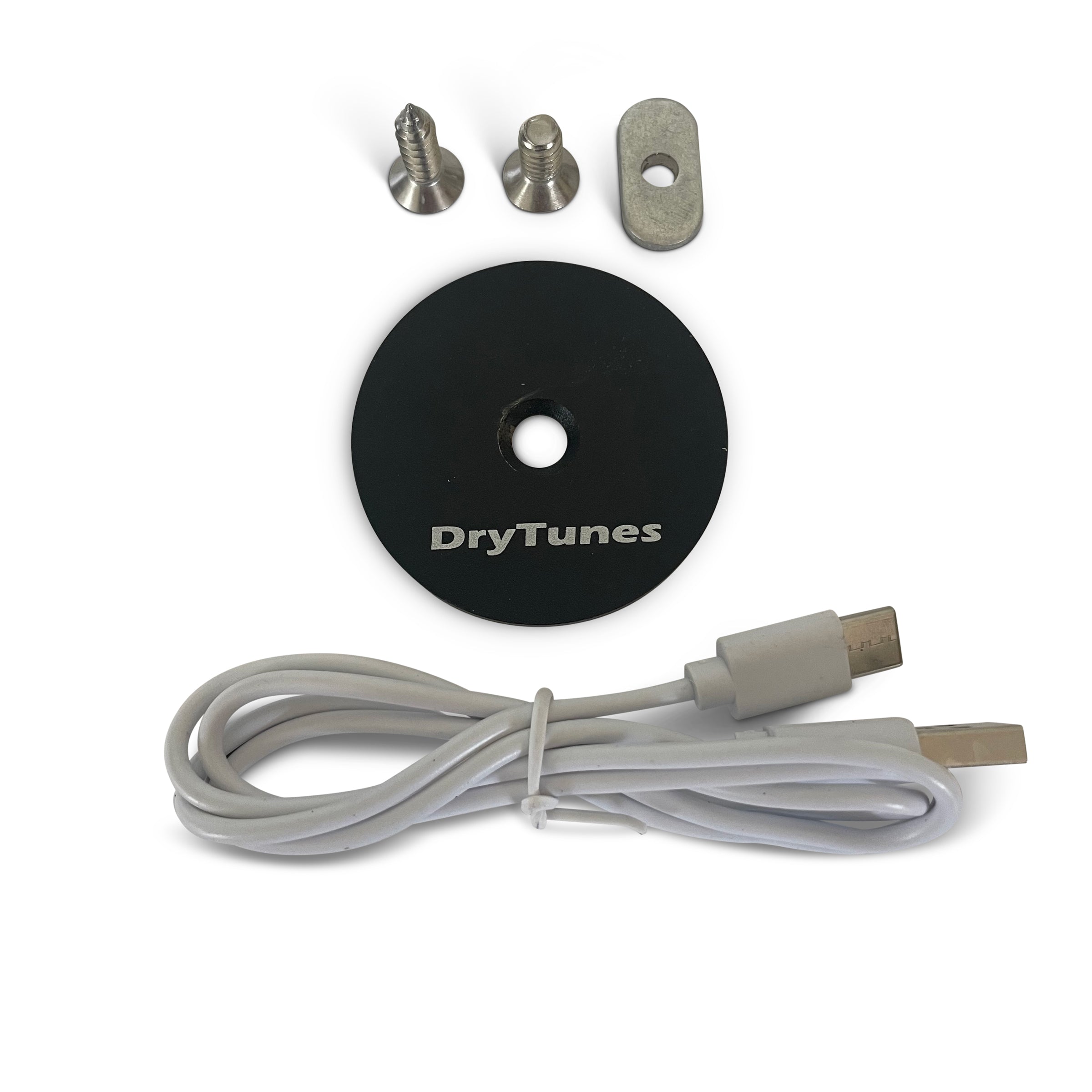Yak Power DryTunes waterproof floating Bluetooth speaker outdoors, showing its compact design and waterproof features for portable audio.