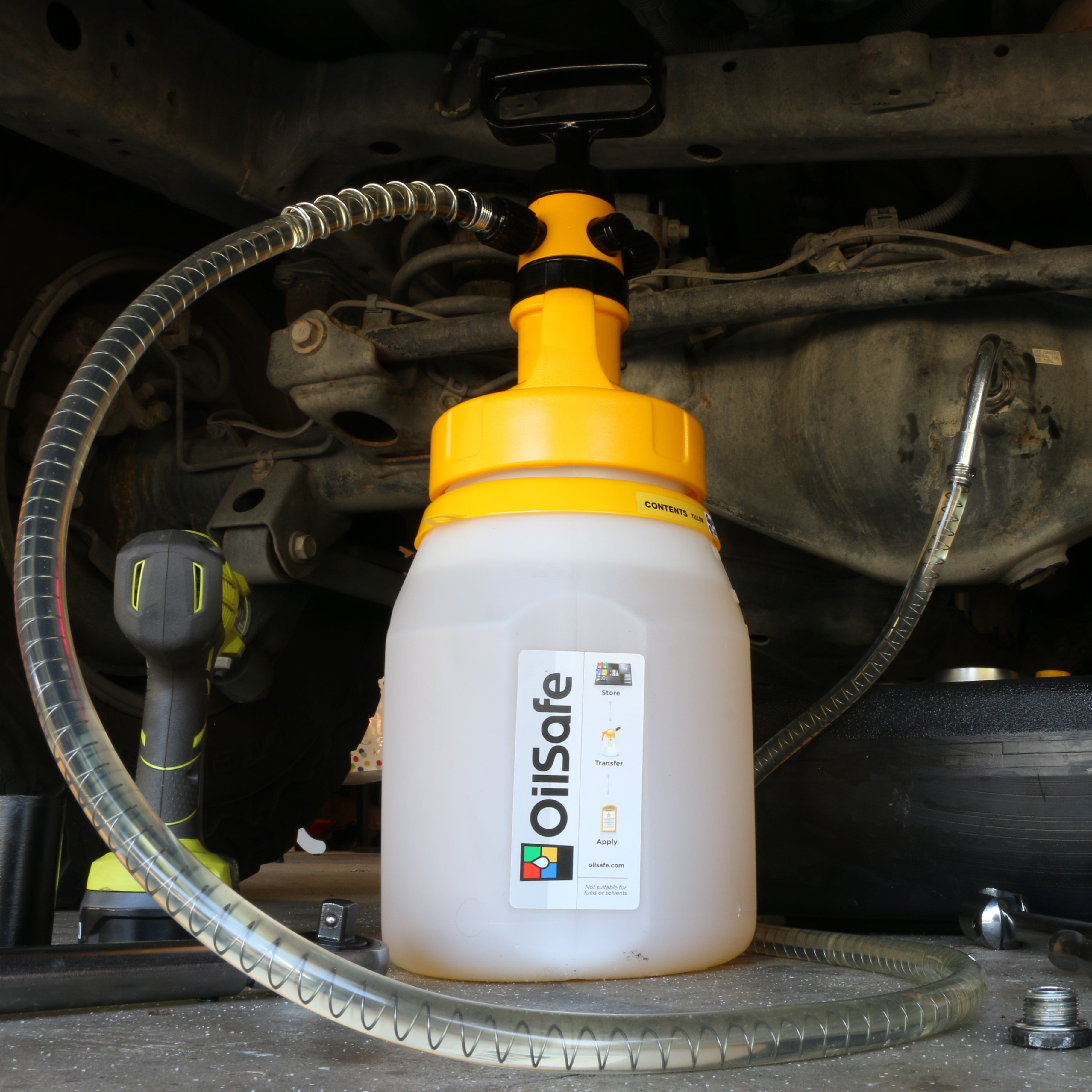 OilSafe transfer container starter kit by DRIVEN Racing Shop with multiple fluid transfer bottles and caps in a compact set.