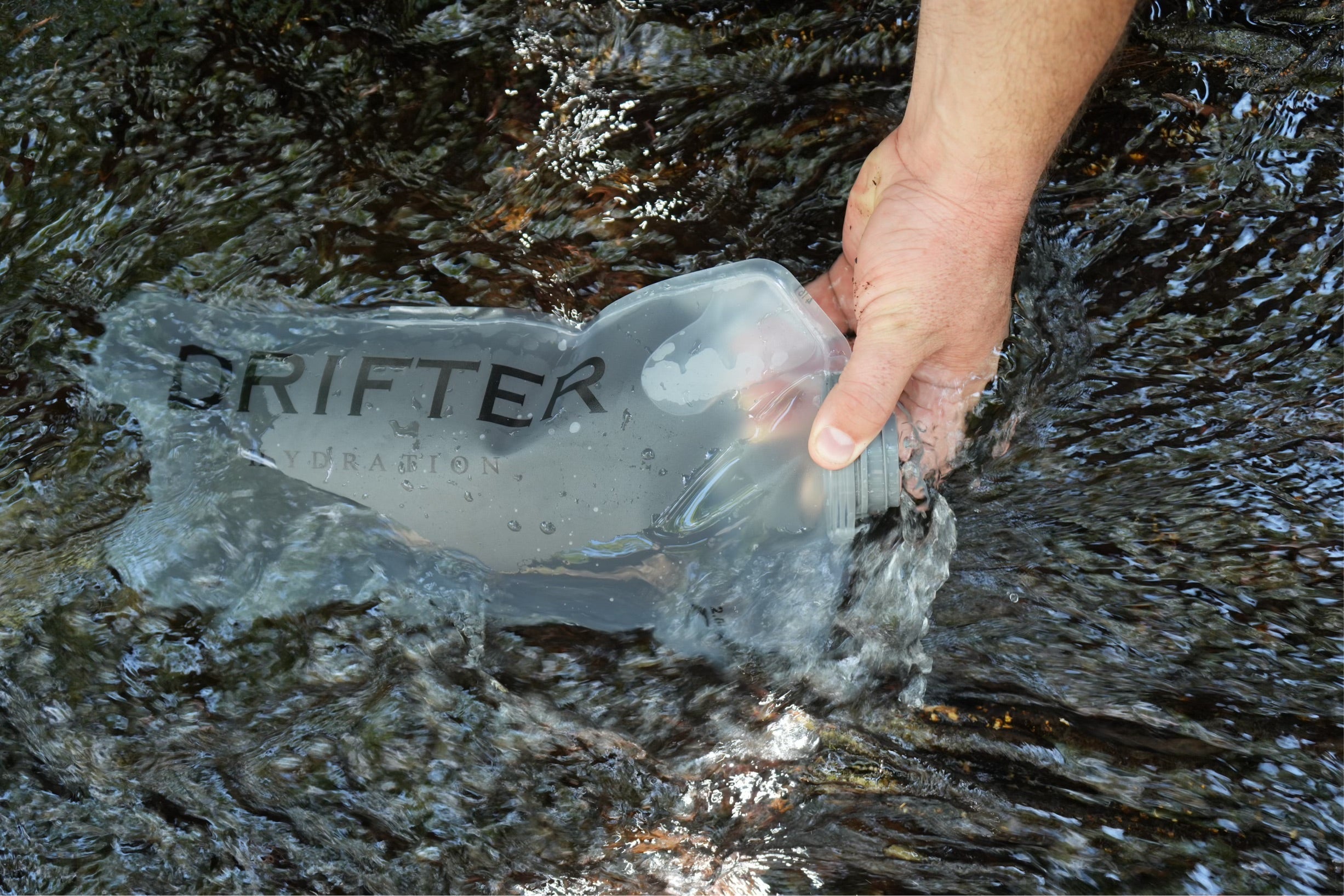 Drifter Hydration System bundle featuring water reservoir, hose, and bite valve for outdoor hydration needs.