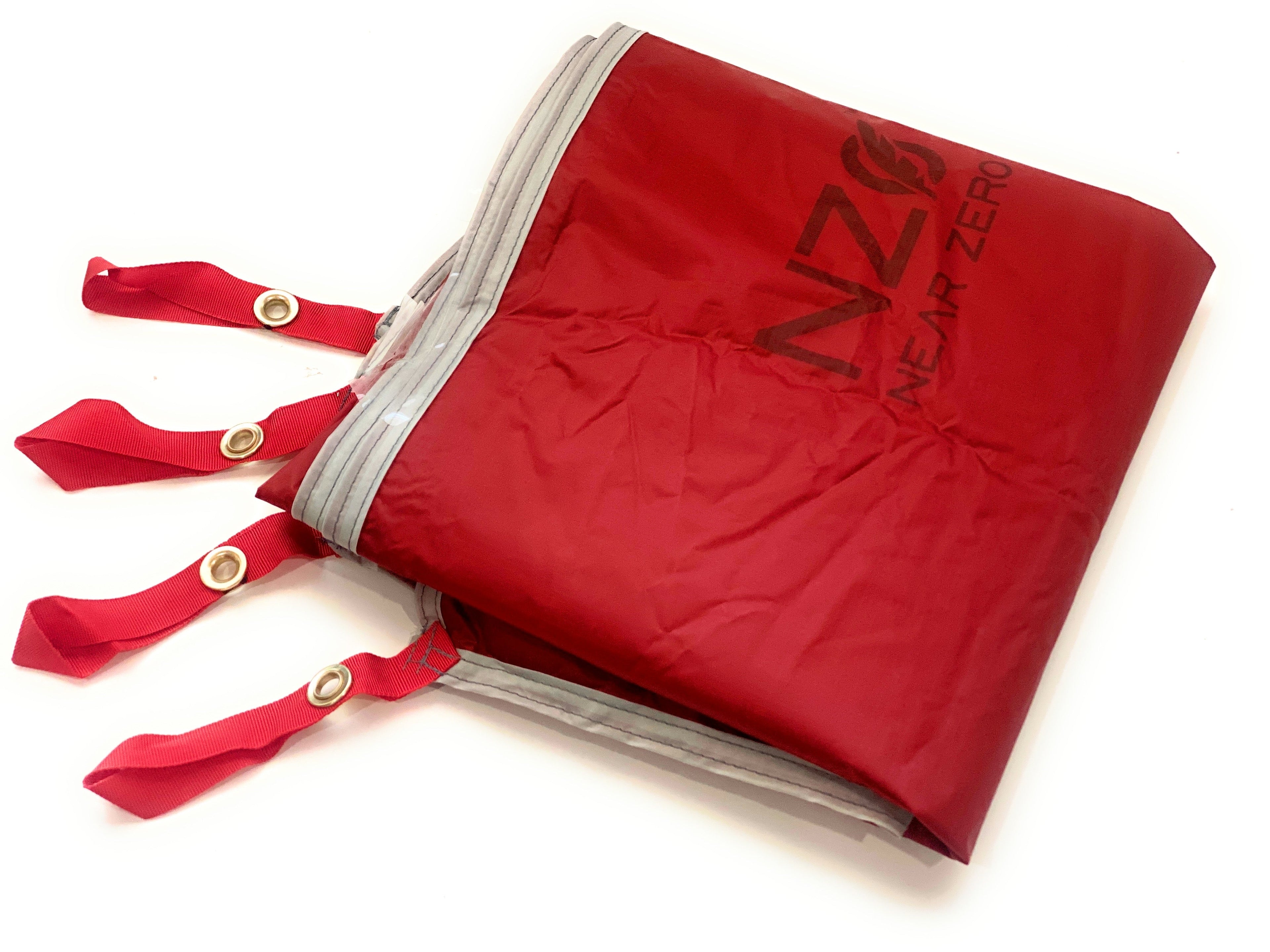 Near Zero Outdoor Gear 3P DynaLite footprint for tents, showing a lightweight protective tent ground cover on a grassy surface.