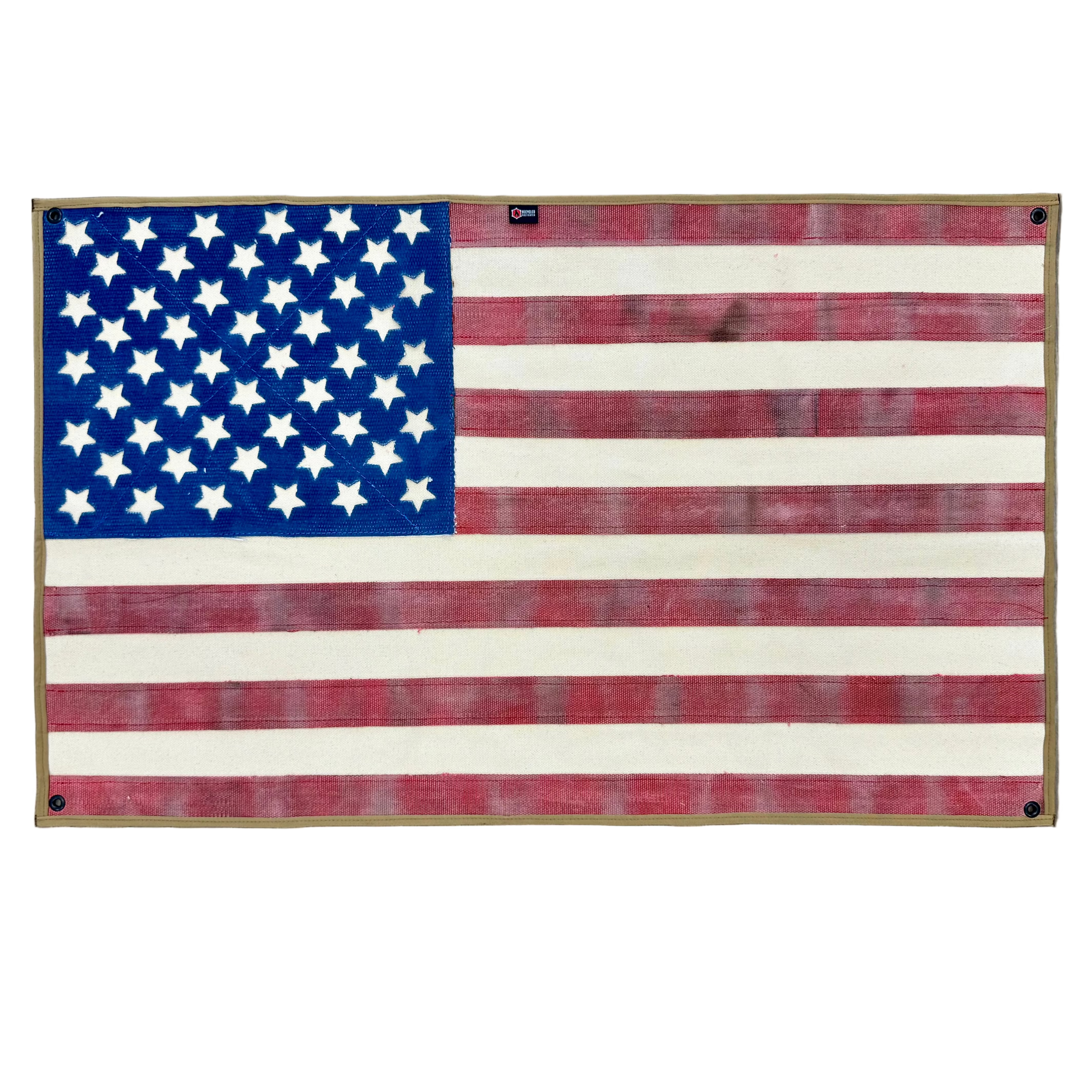 Vintage American flag made from recycled fire hose by Recycled Firefighter, showcasing a rustic and patriotic design.