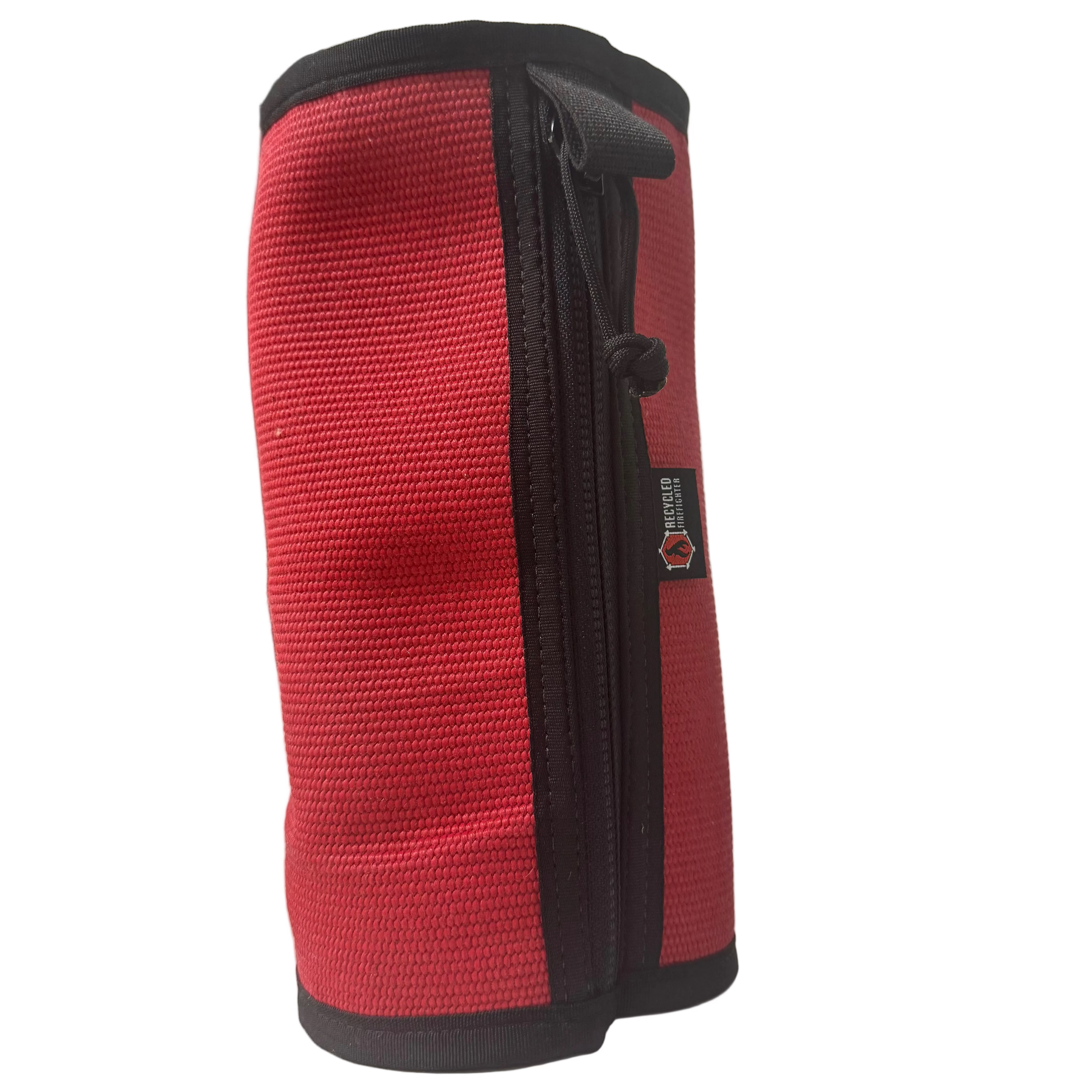 Recycled Firefighter Fire Hose Dopp Kit with zippered compartment and durable fabric, ideal for travel and organization.