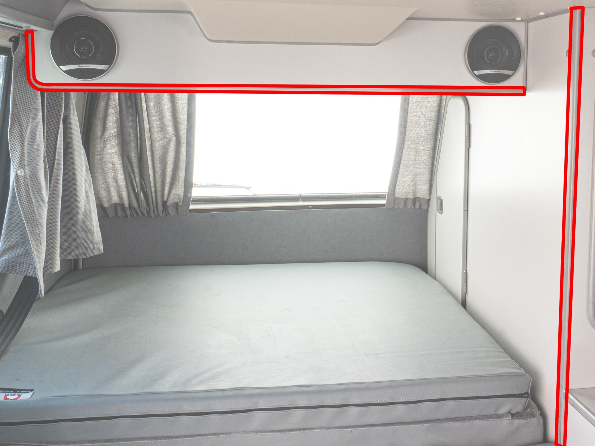 GoWesty cabinetry edge molding for Vanagon Westfalia, 25 feet long, shown installed on wooden cabinet edges in a camper interior.