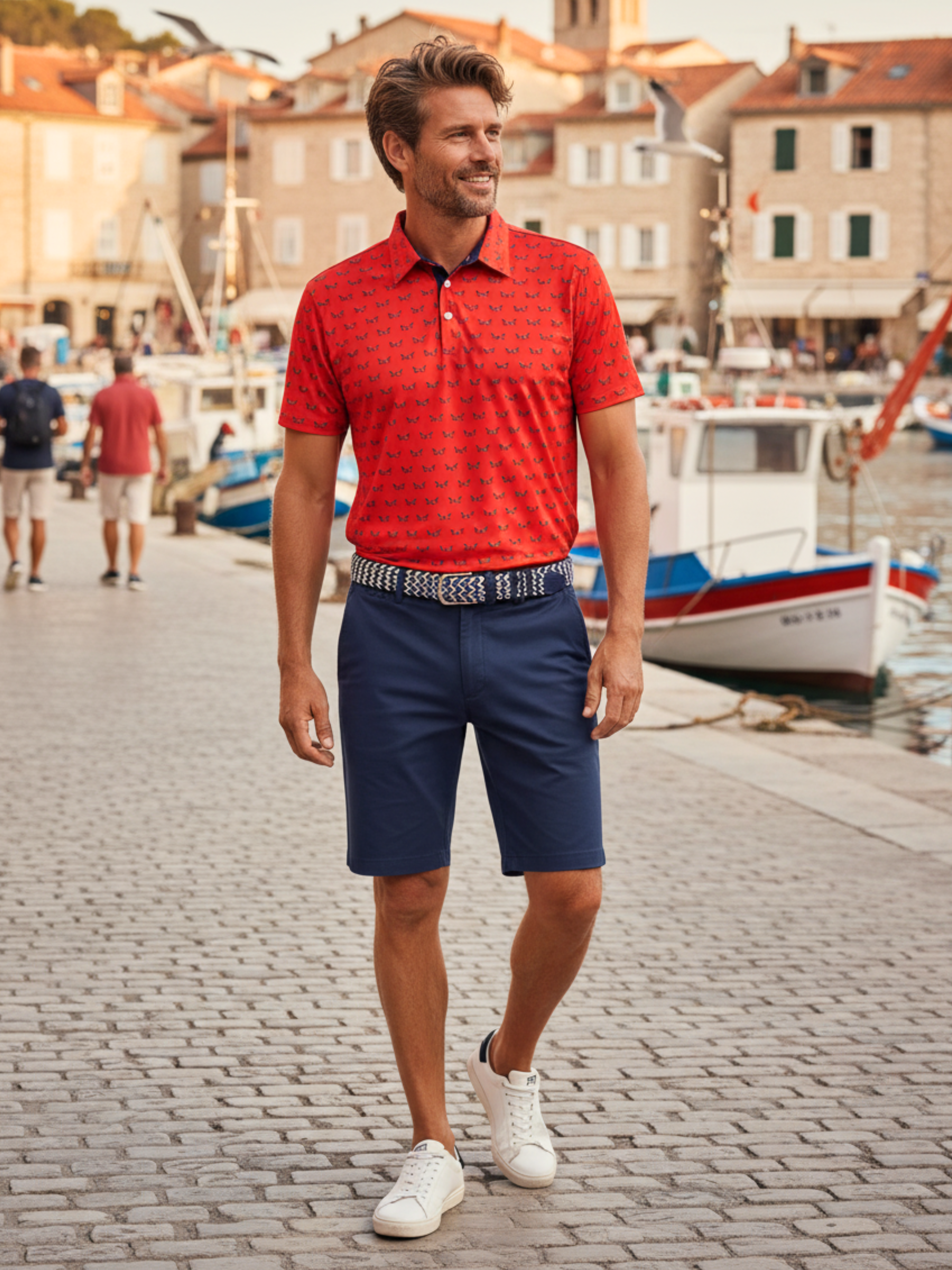 Navy Independence Polos by White Water Life displayed on a flat surface, showcasing fabric texture and collar details.