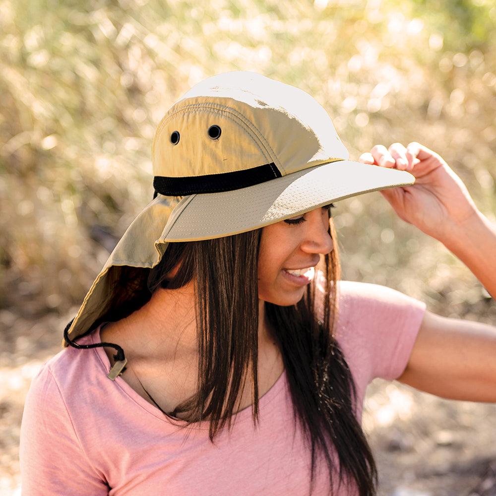 Juniper Outdoor Nature Hat in neutral color, featuring wide brim and adjustable strap, designed for outdoor adventures.
