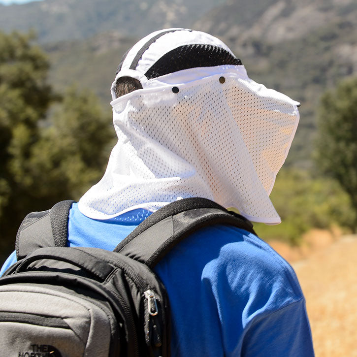 Juniper Outdoor River Bank Hat displayed on a model, featuring a wide brim and casual outdoor style for sun protection.