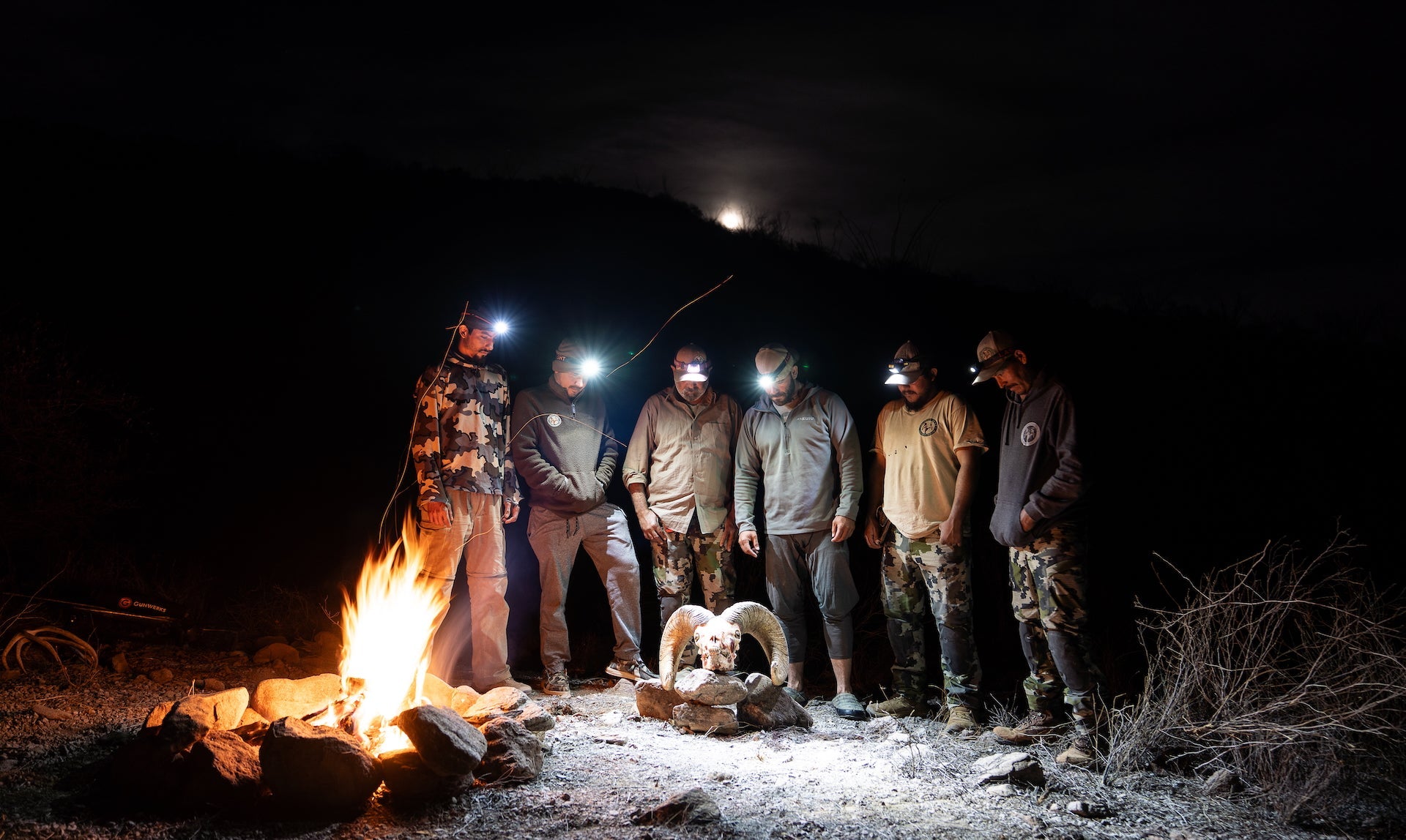 Last Light LLC Strike 1800 headlamp with adjustable straps and bright LED light, suitable for outdoor activities and hands-free use.