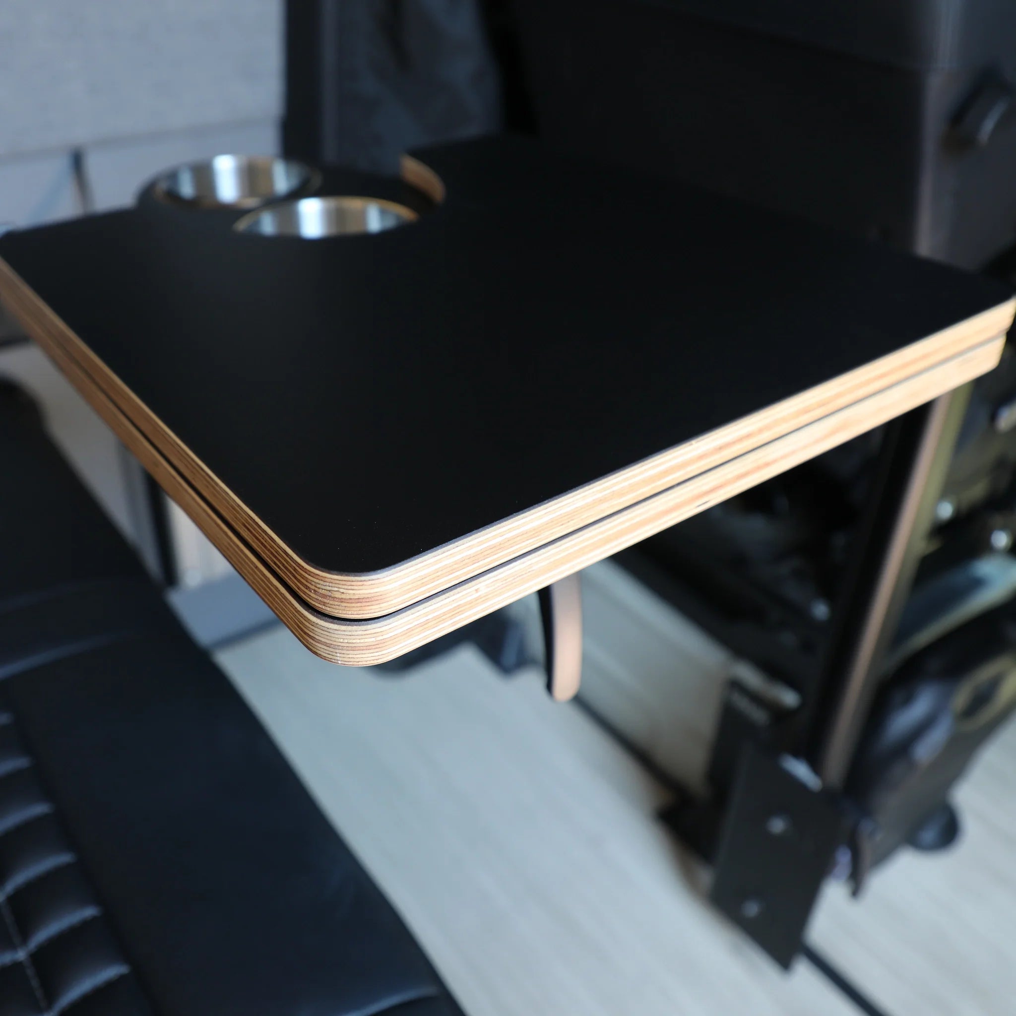 Carbon-colored Jenna 2.0 folding table top by Canyon Adventure Vans, CAV branded, showing a sleek, portable table surface.