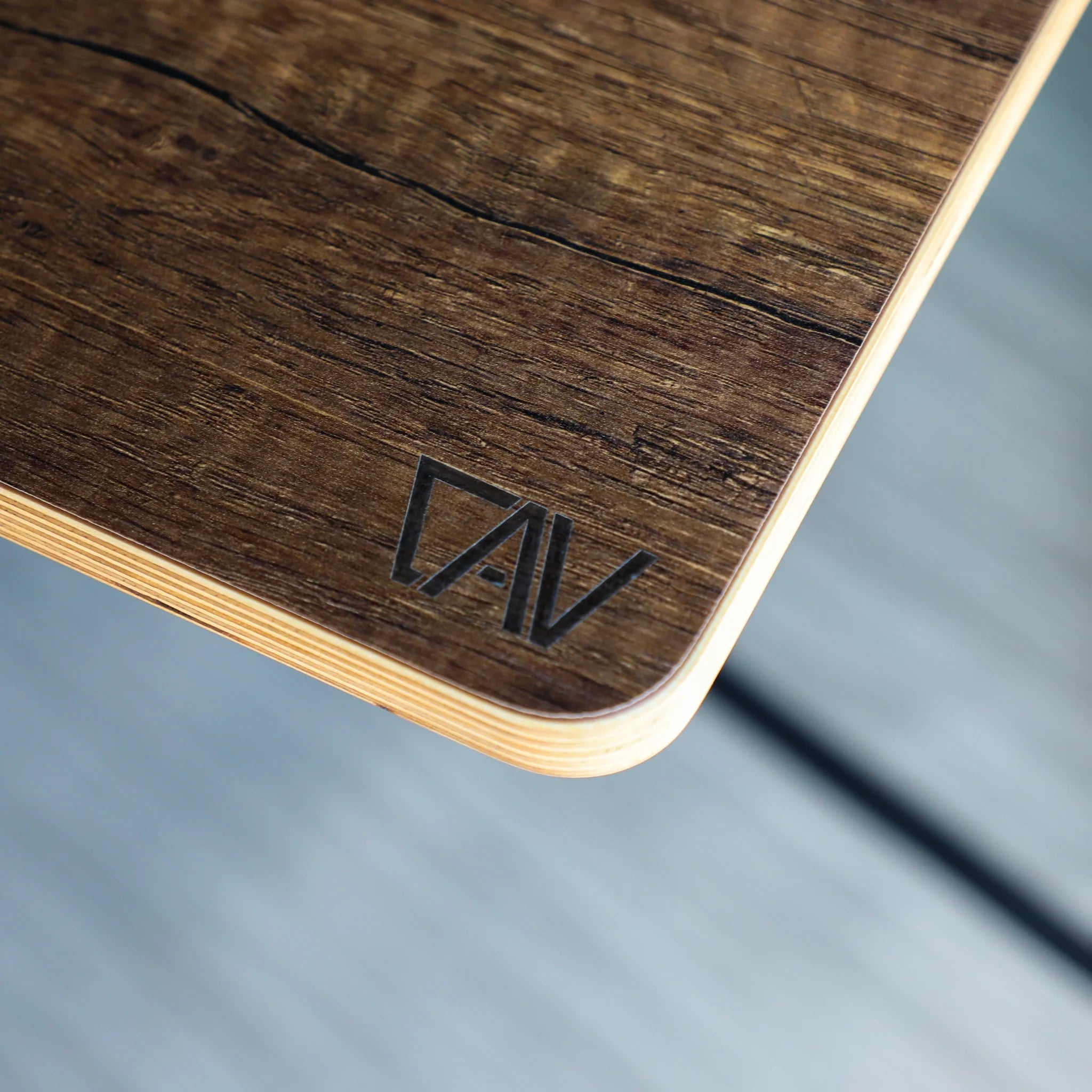 Canyon Adventure Vans Jenna 2.0 folding table top in Gavi Oak finish, showcasing its smooth wooden surface and portable design.