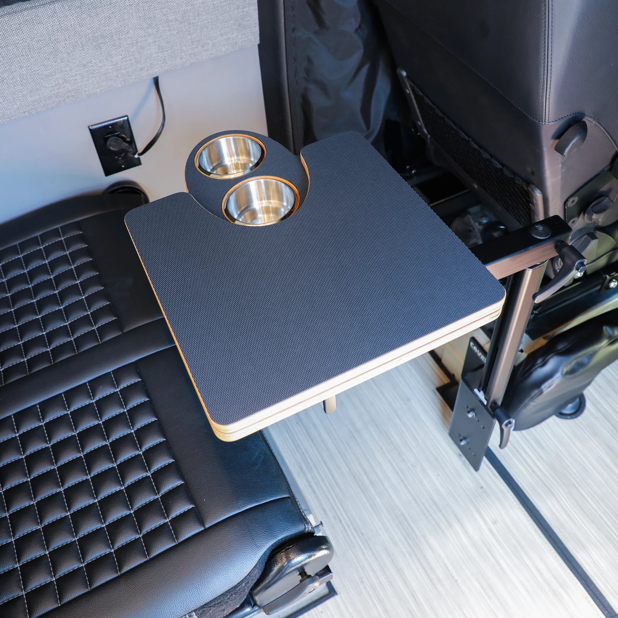 Navy blue Jenna 2.0 folding table top by Canyon Adventure Vans, showcasing a compact, portable table surface with a smooth finish.