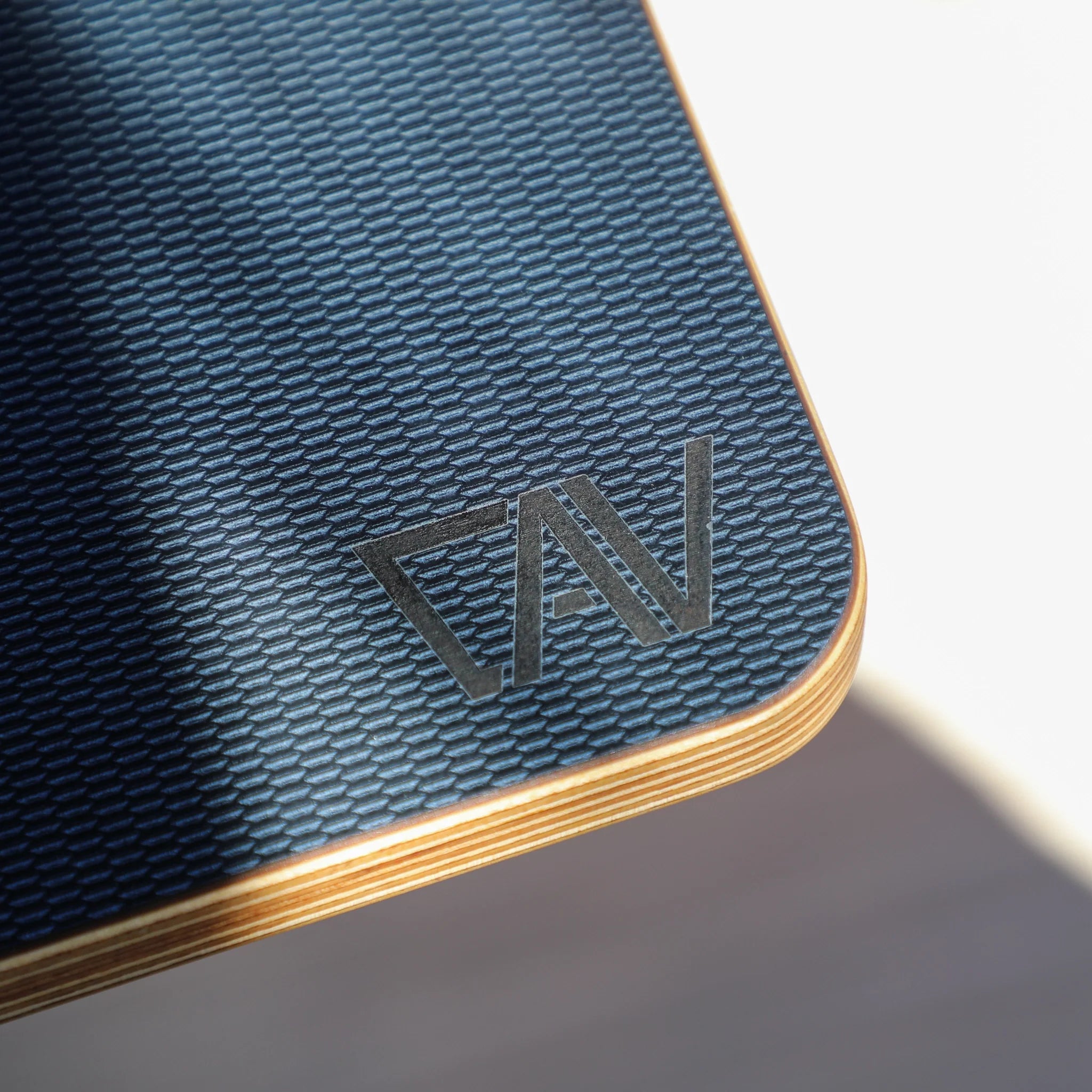 Navy blue Jenna 2.0 folding table top from Canyon Adventure Vans, CAV branded product, showing its smooth surface and compact design.