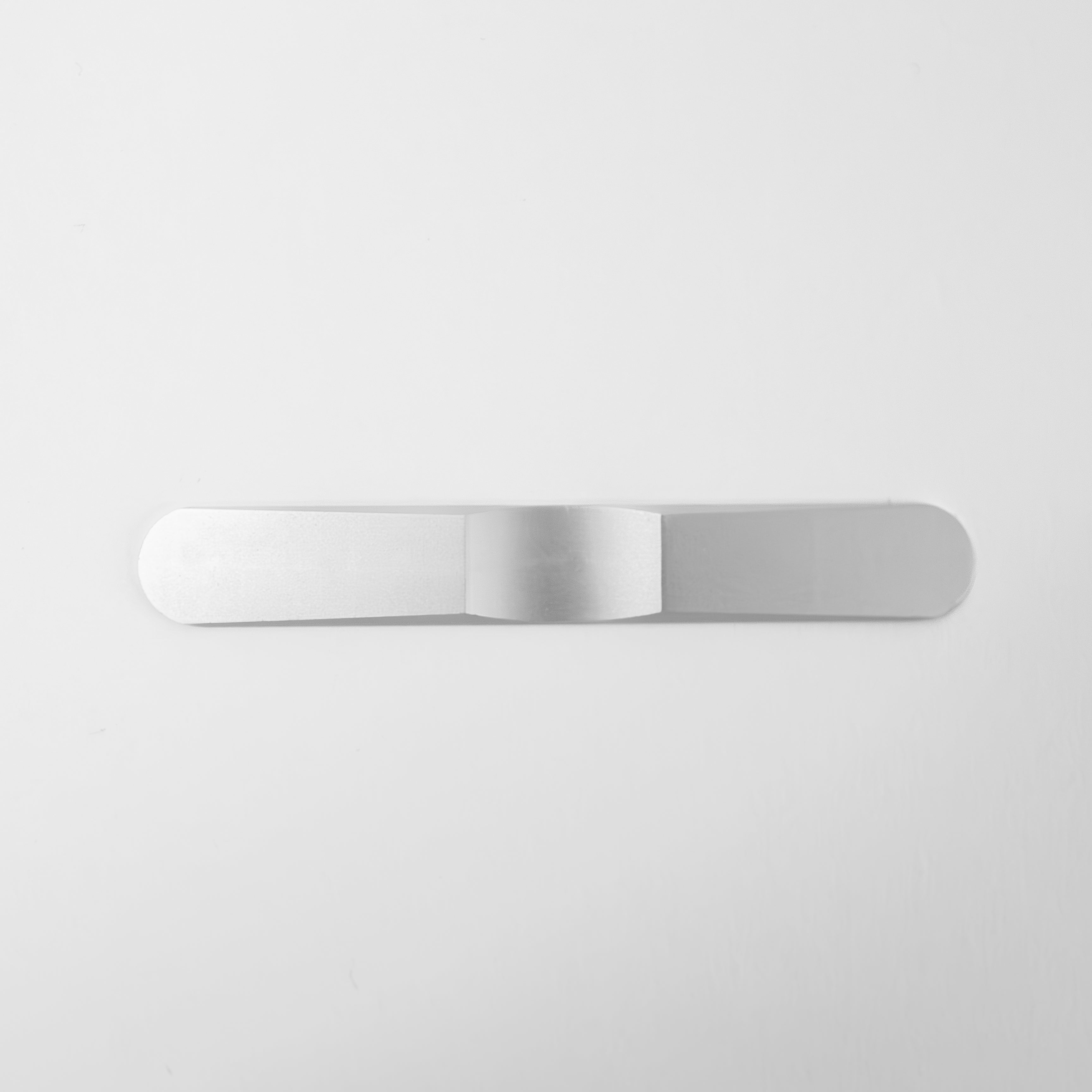 Universal mid-door slider kit from The Van Mart, showing metal components and sliding mechanism for easy door installation.