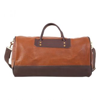 Backcountry Sportsman Bison Leather Sportsman’s Duffel bag showing its durable brown leather exterior and sturdy handles.