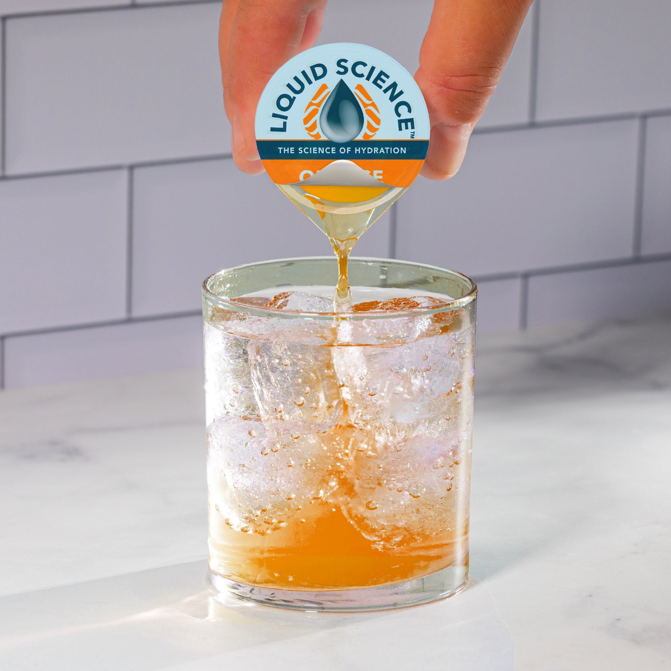 Java House Liquid Science Orange Hydration Pods in vibrant orange packaging, showcasing the product's flavor and design.