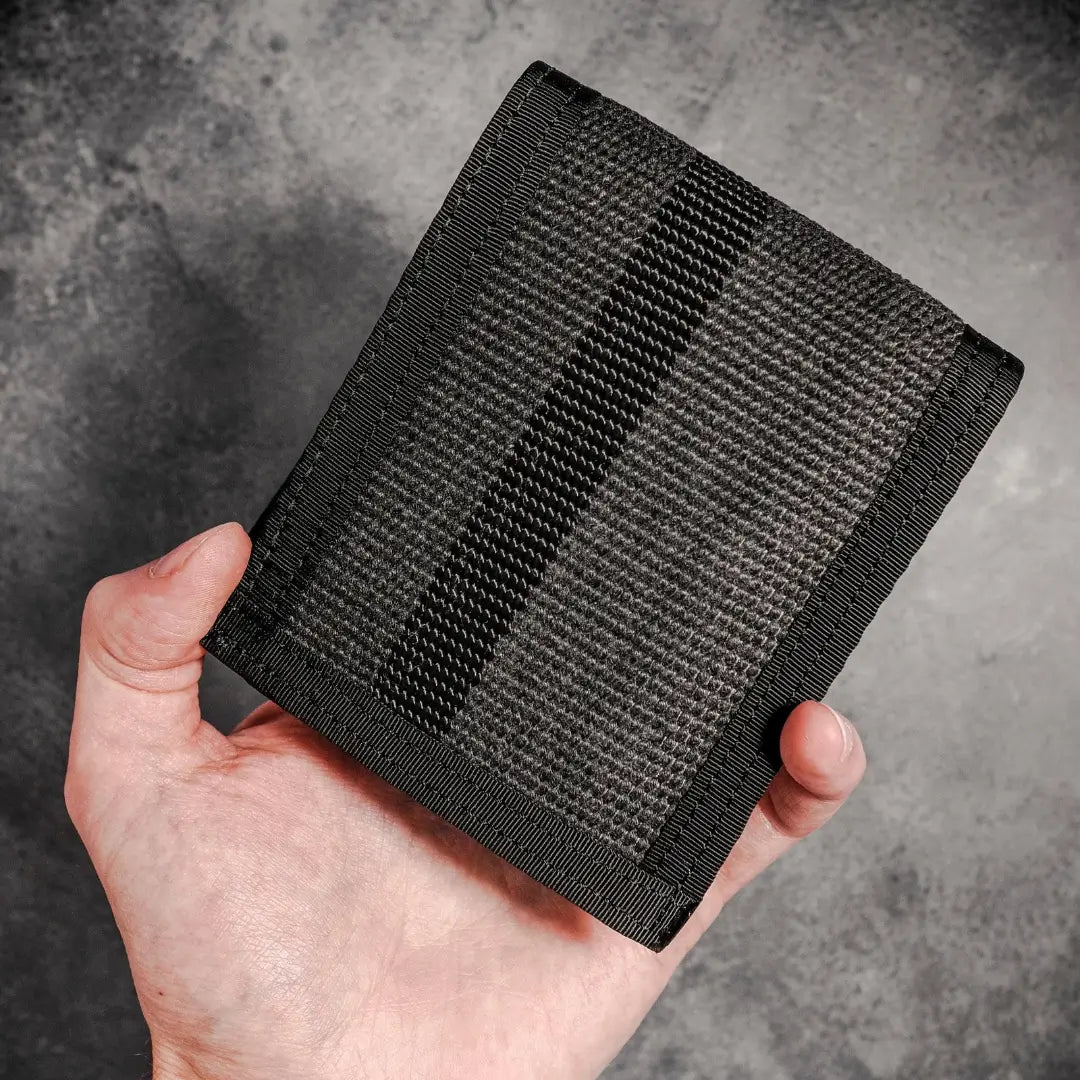 Recycled Firefighter Lieutenant Wallet Firehose Edition in black with firehose material and multiple card slots, durable and eco-friendly.