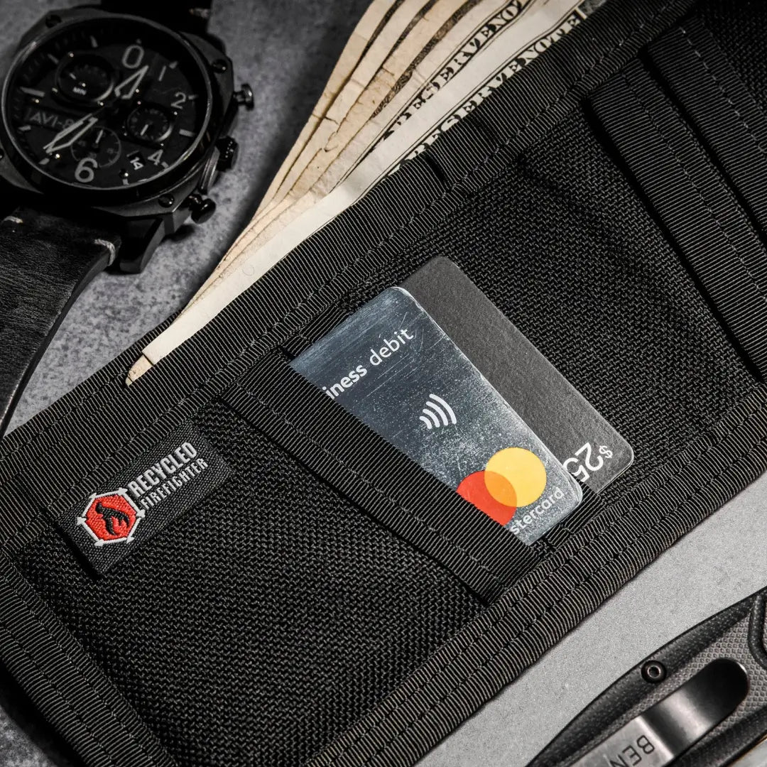 Recycled Firefighter Lieutenant Wallet Firehose Edition in black made from recycled firehose material, showcasing a durable wallet design.