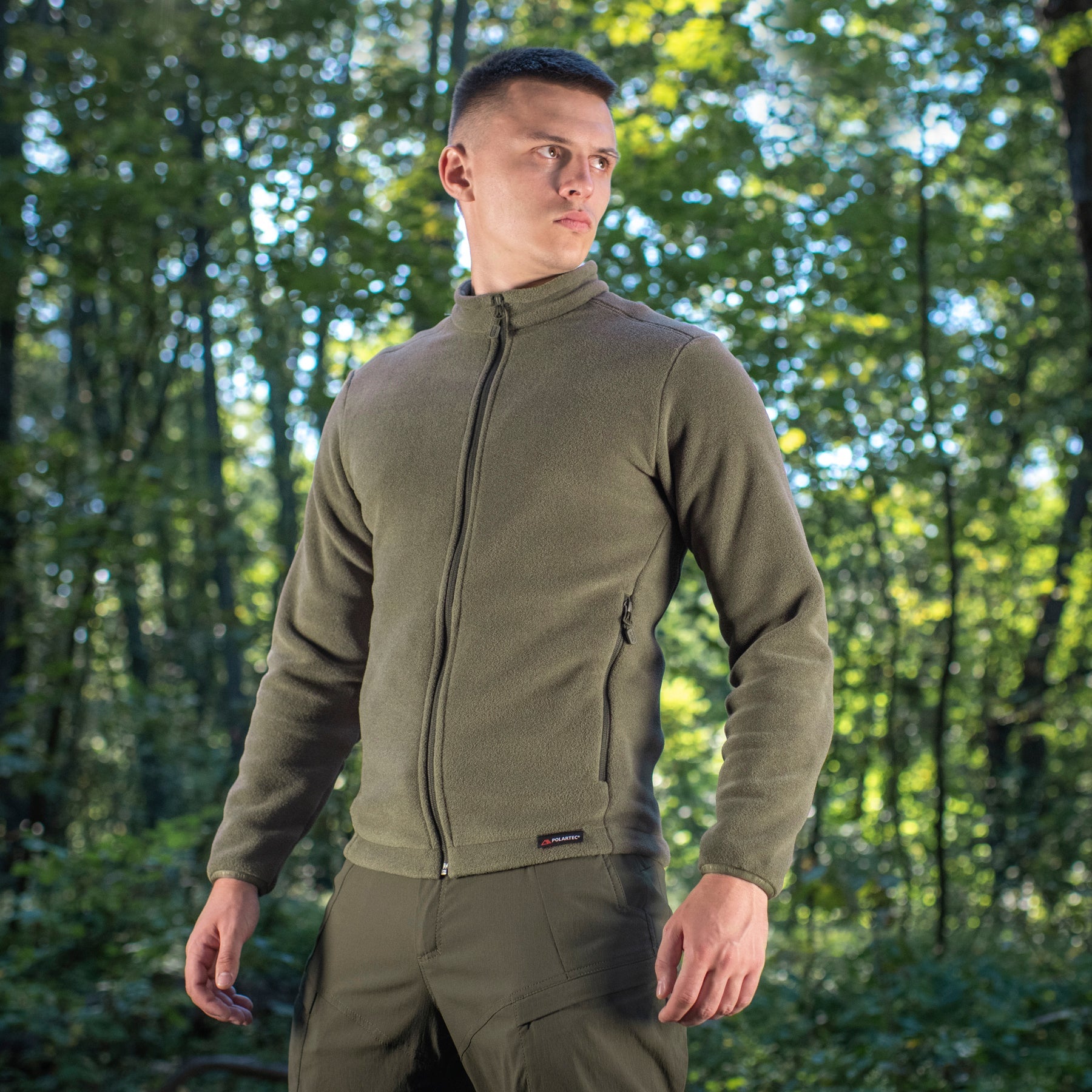 M-TAC Nord Polartec fleece jacket in olive green, showcasing soft fabric and zippered front design.