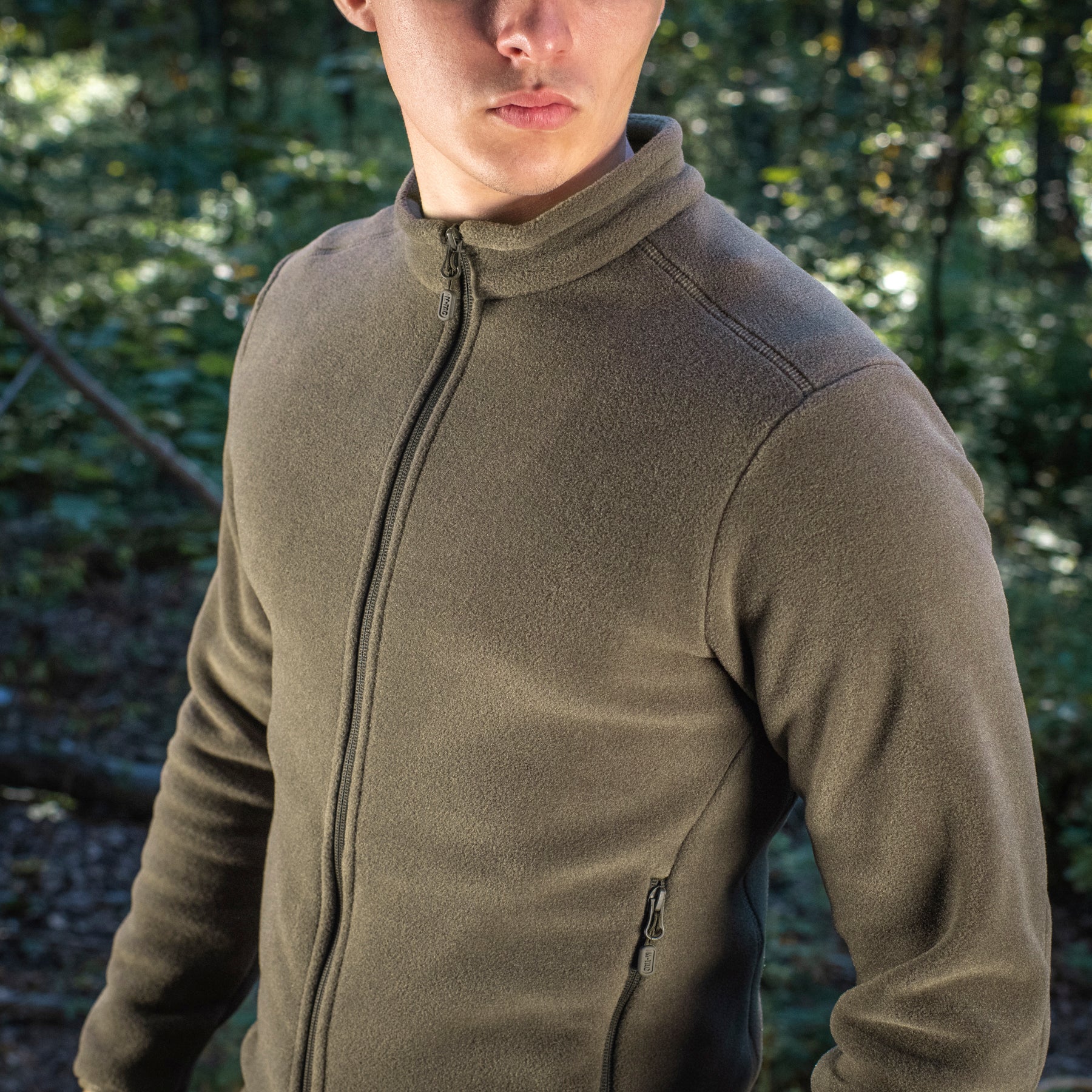 M-TAC Nord Polartec fleece jacket in olive green, featuring a durable and warm design for outdoor activities.