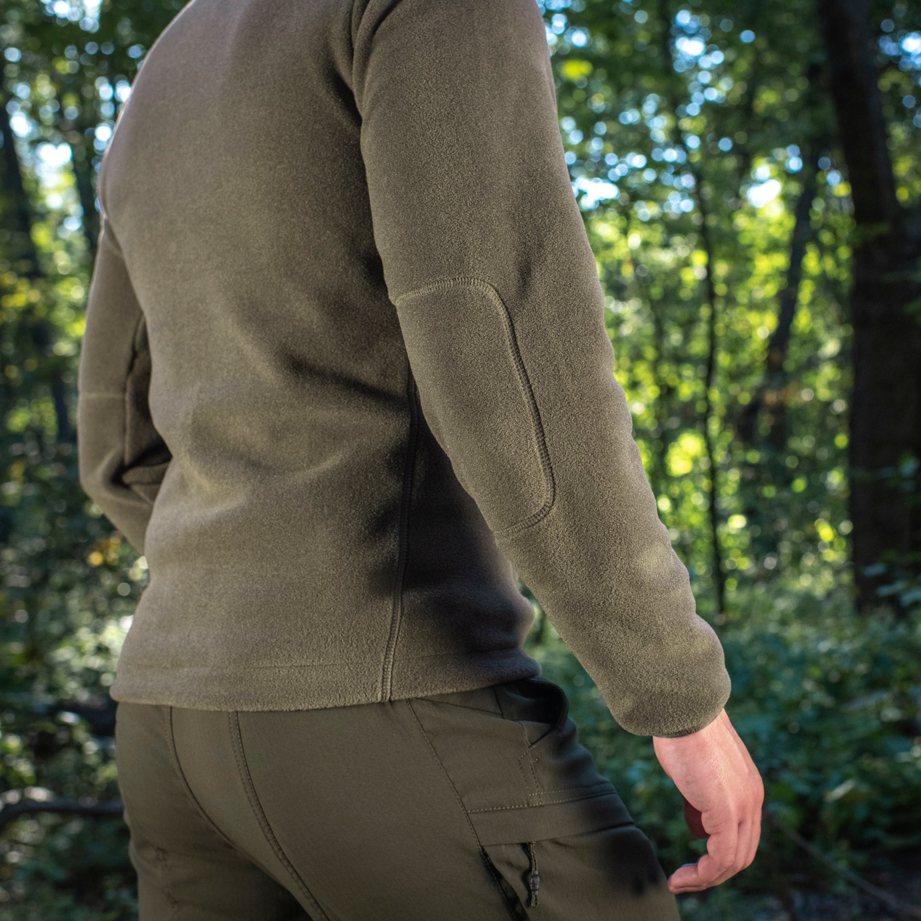 M-TAC Nord Polartec fleece jacket in olive green, showcasing soft fabric and zippered front for warmth and comfort.