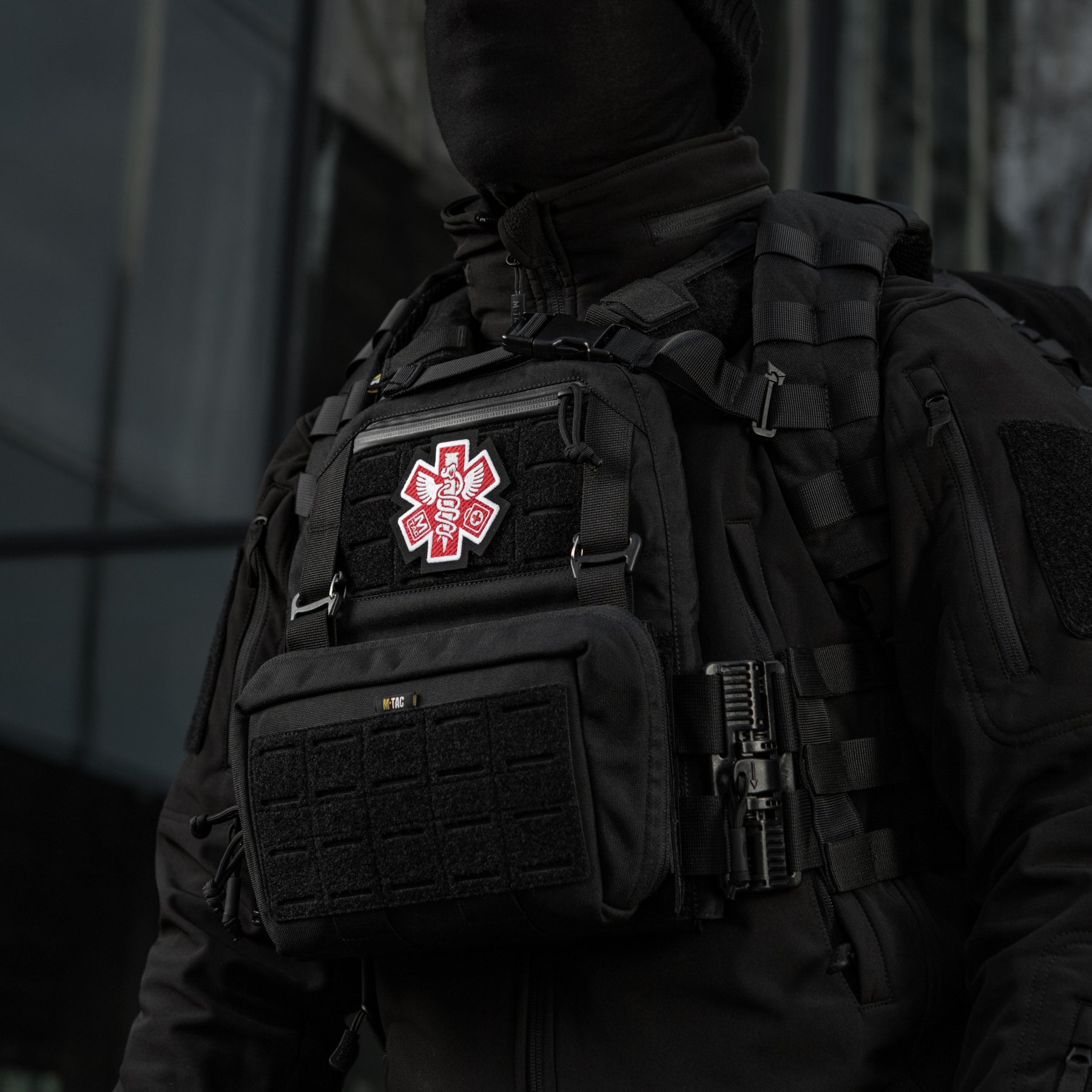 M-Tac Paramedic embroidered patch featuring a black and red design, ideal for uniforms or tactical gear.