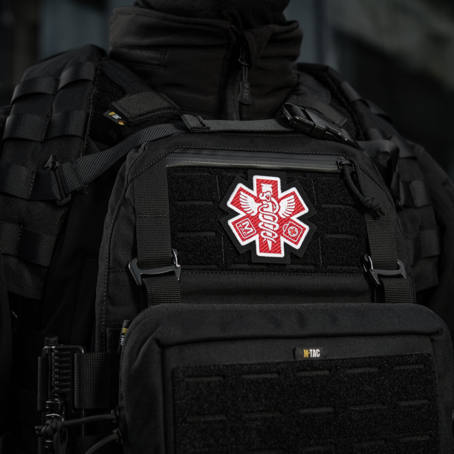 Embroidered M-Tac Paramedic patch in black, showcasing detailed paramedic emblem design.