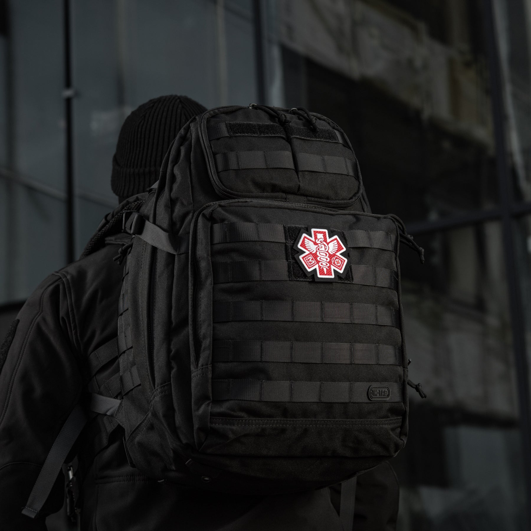 M-Tac Paramedic embroidered patch featuring bold red and white design on a black background.