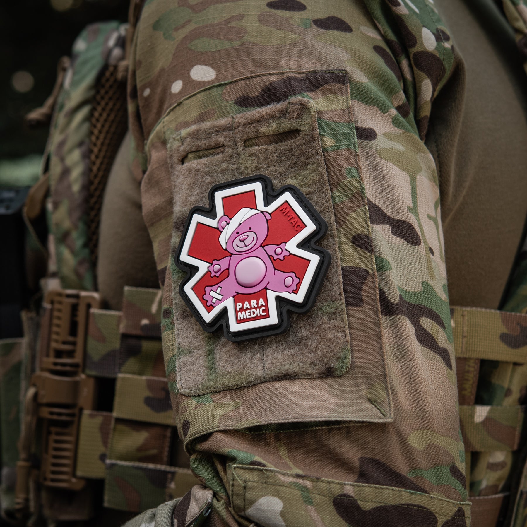 Embroidered M-TAC Paramedic Bear patch in pink and black, featuring detailed bear design on a durable fabric background.