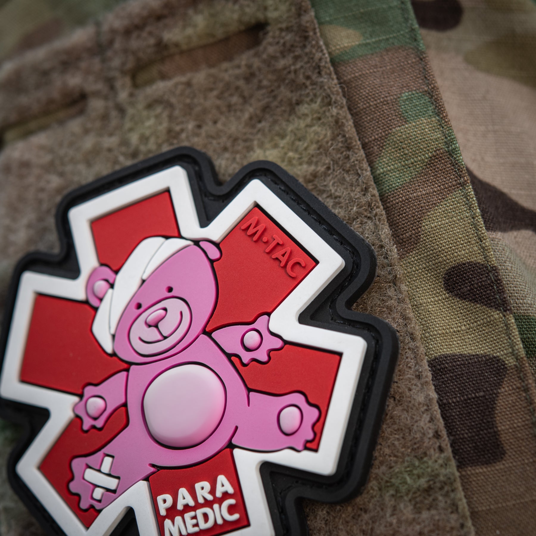 Embroidered M-Tac Paramedic Bear patch in pink and black, featuring detailed bear design on durable fabric.