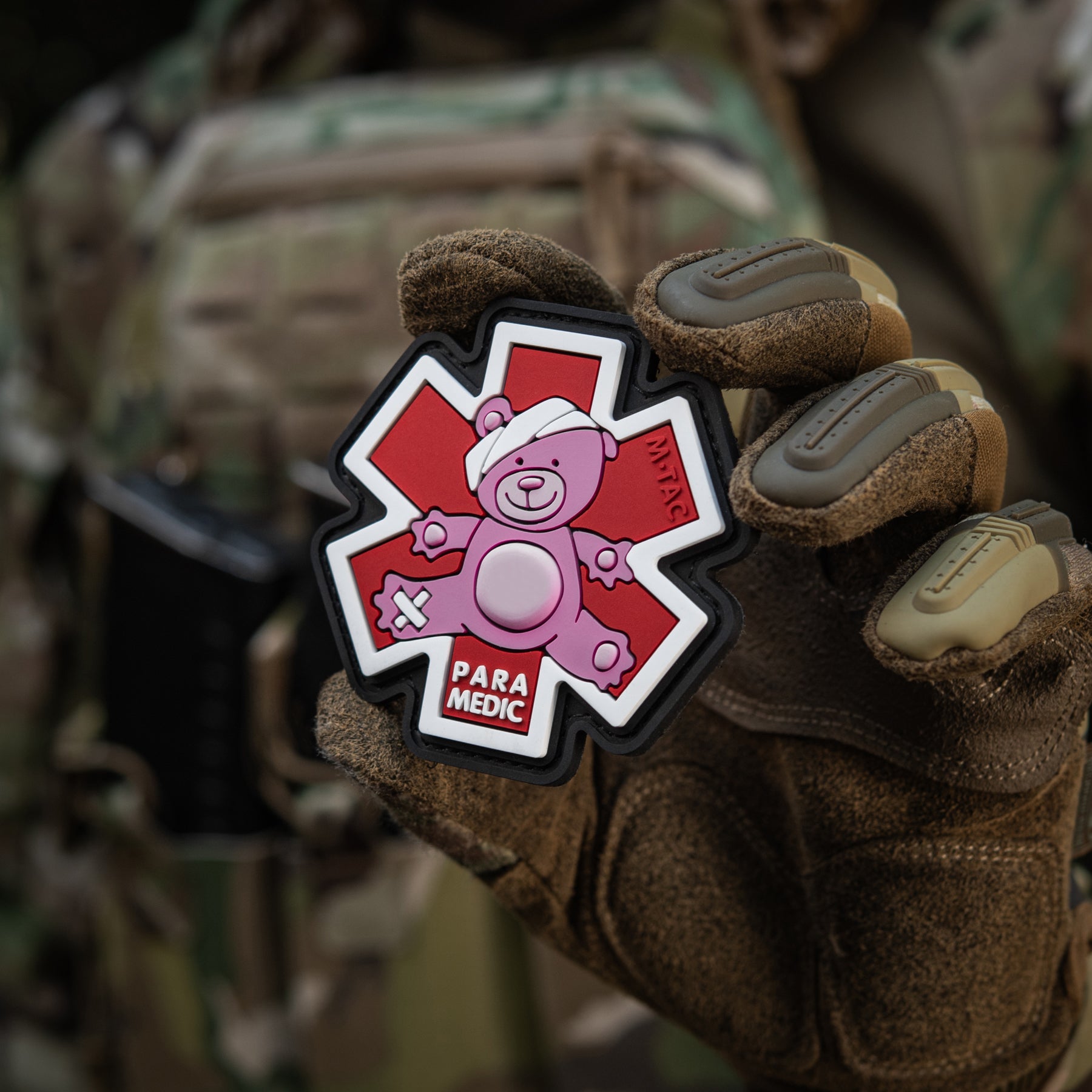 Embroidered M-TAC Paramedic Bear patch in pink and black, featuring detailed bear design and medical symbols.