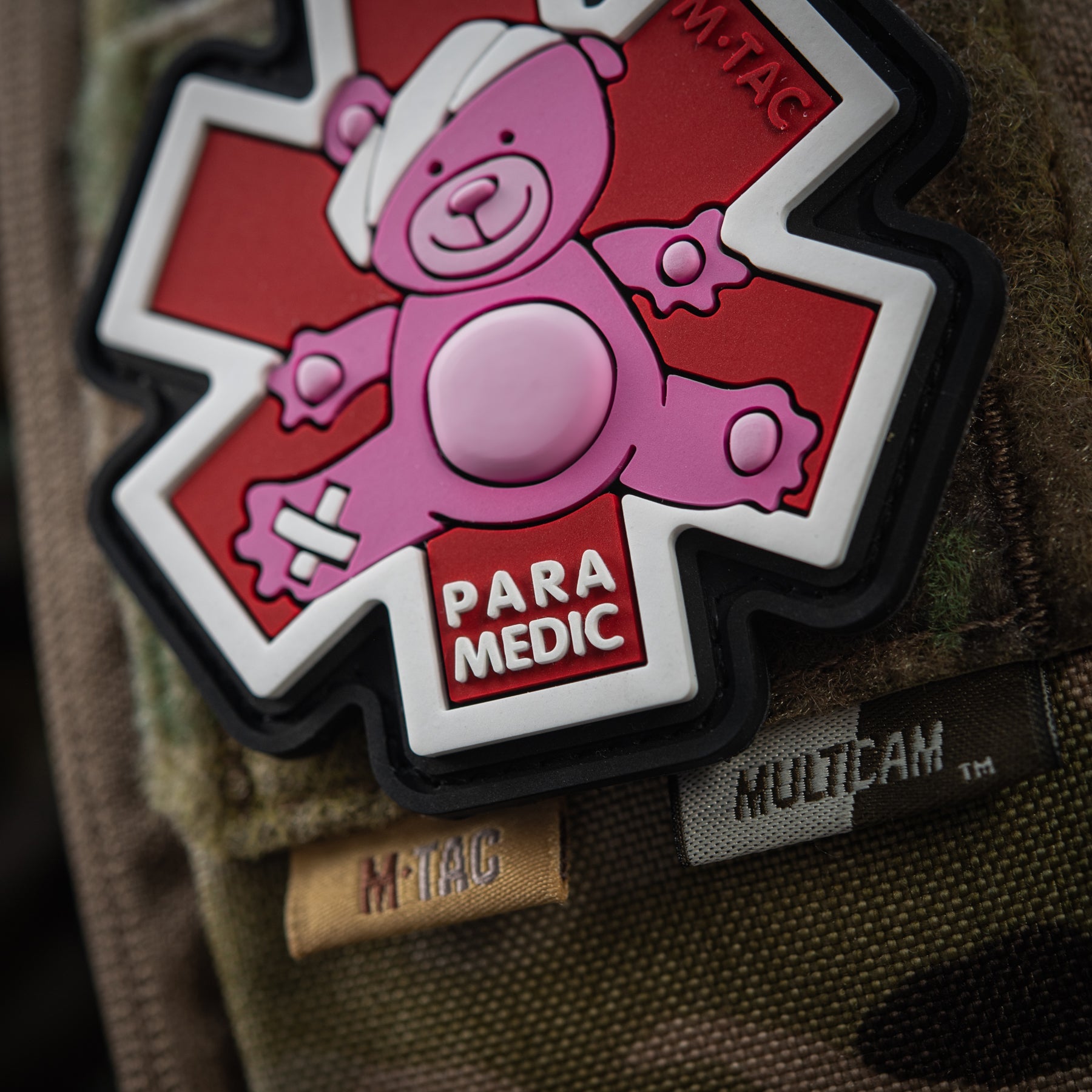 Embroidered M-Tac Paramedic Bear patch in pink and black, featuring detailed bear design for uniforms or gear.