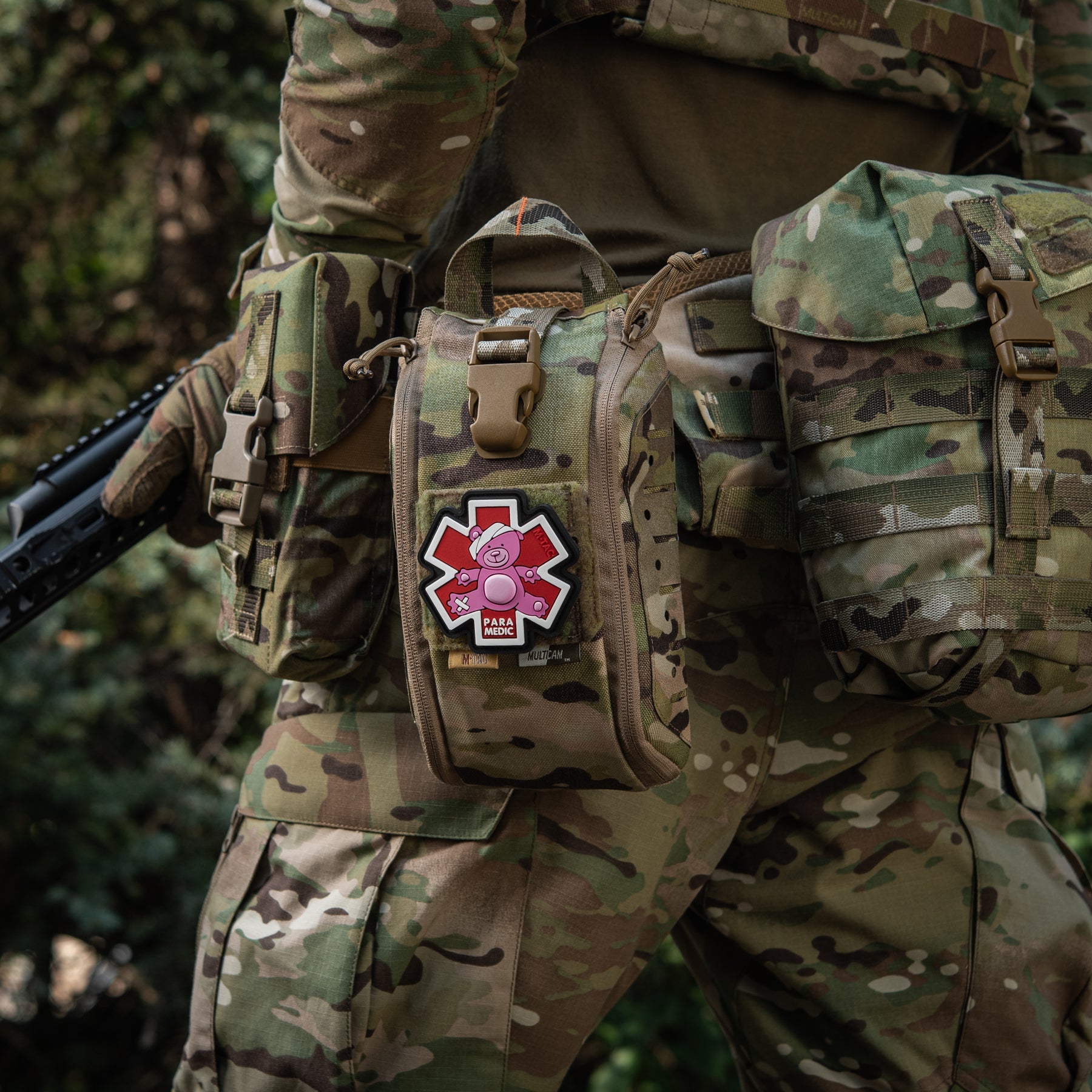 M-Tac embroidered Paramedic Bear patch in pink and black on a textured background.
