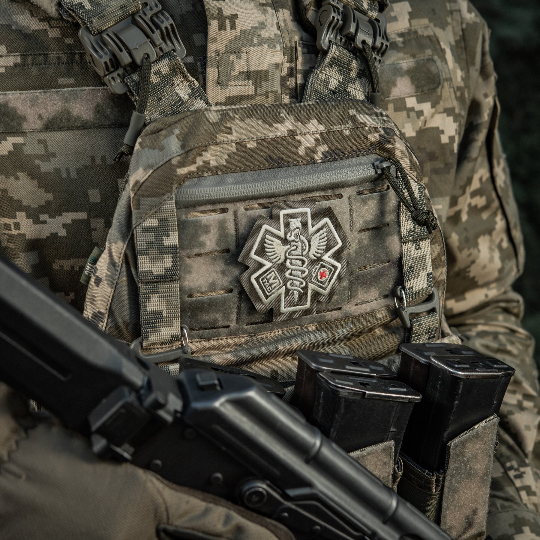 M-Tac Paramedic embroidered patch in ranger green, featuring detailed medical cross design on sturdy fabric.
