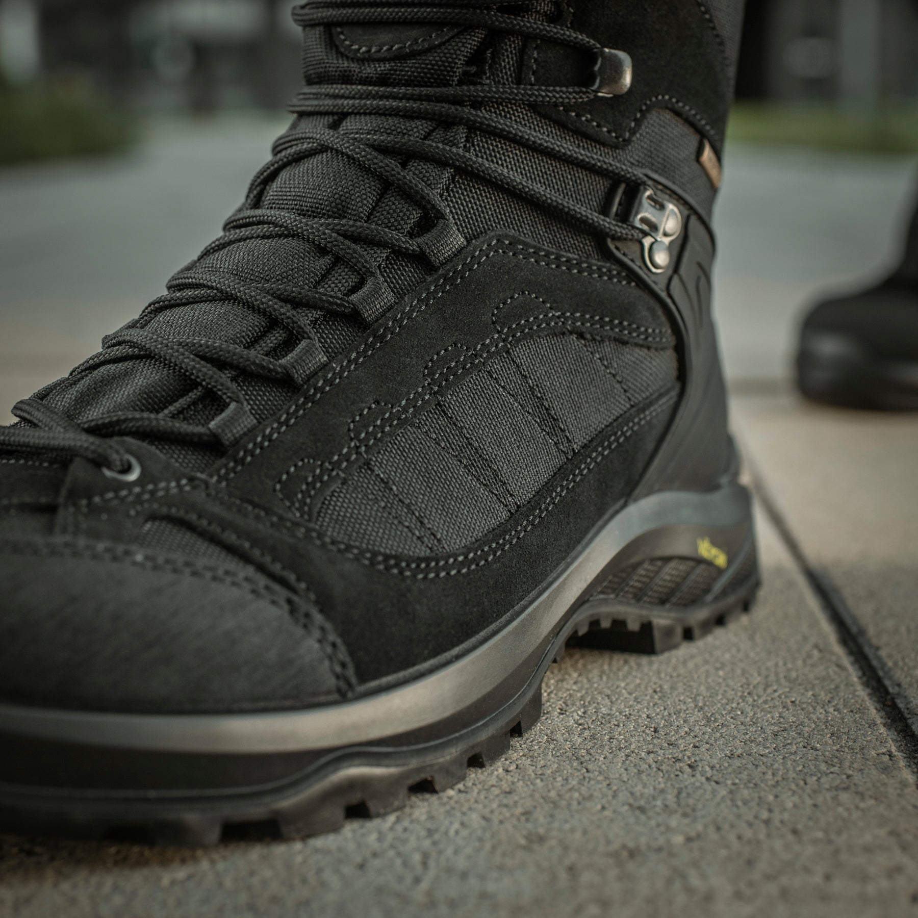 Black M-Tac Tactical Boots Demi-Season Pro Line with rugged design and sturdy soles for outdoor and tactical use.