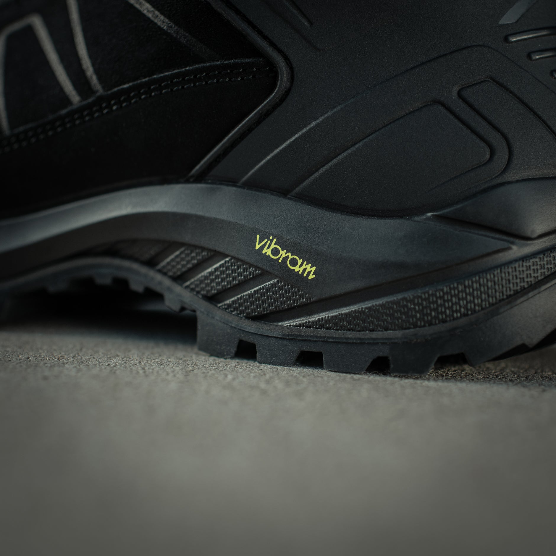Black M-Tac tactical winter boots with rugged design, durable soles, and reinforced uppers for cold weather outdoor use.