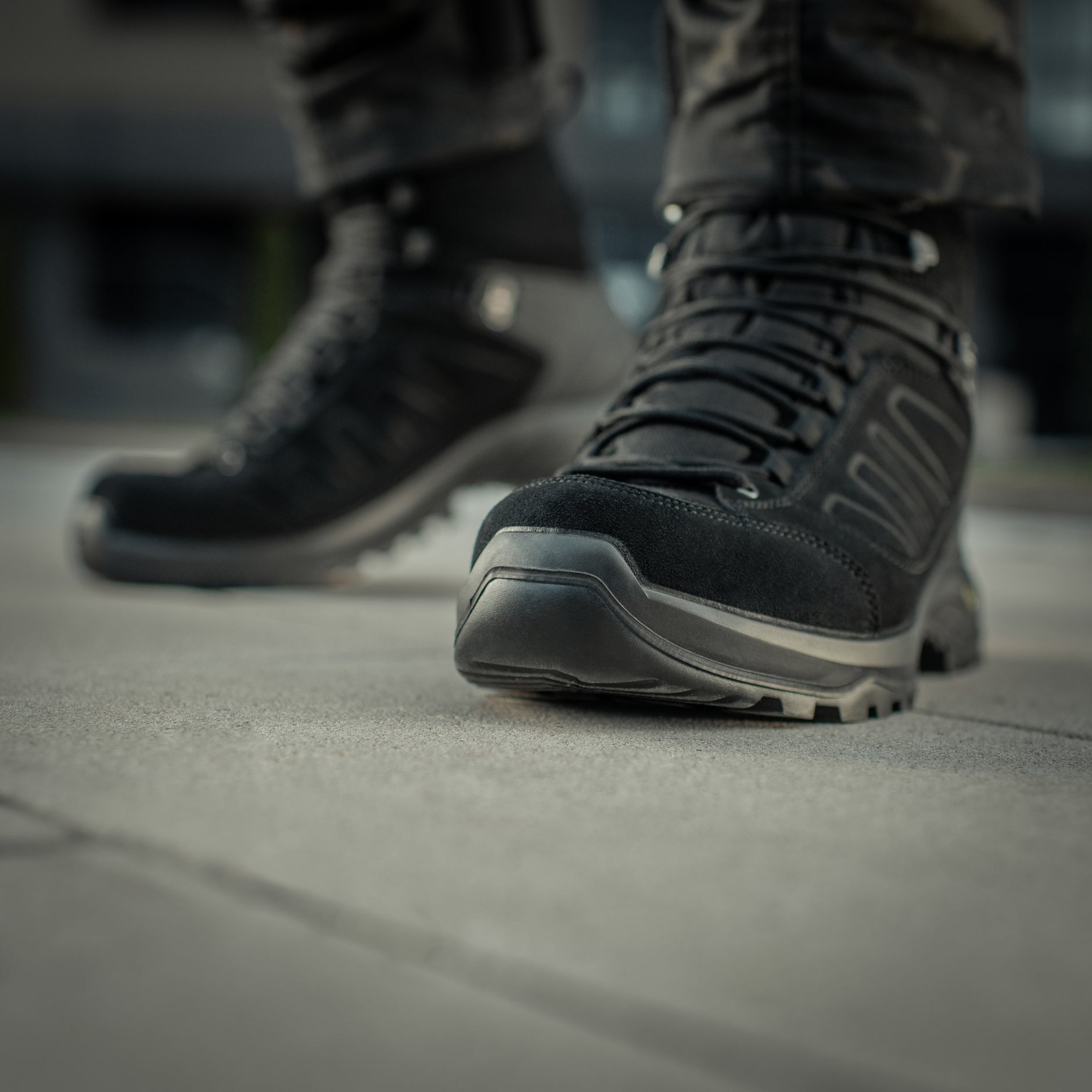 Black M-Tac Tactical Winter Boots with rugged design, durable soles, and insulated lining for cold weather outdoor use.