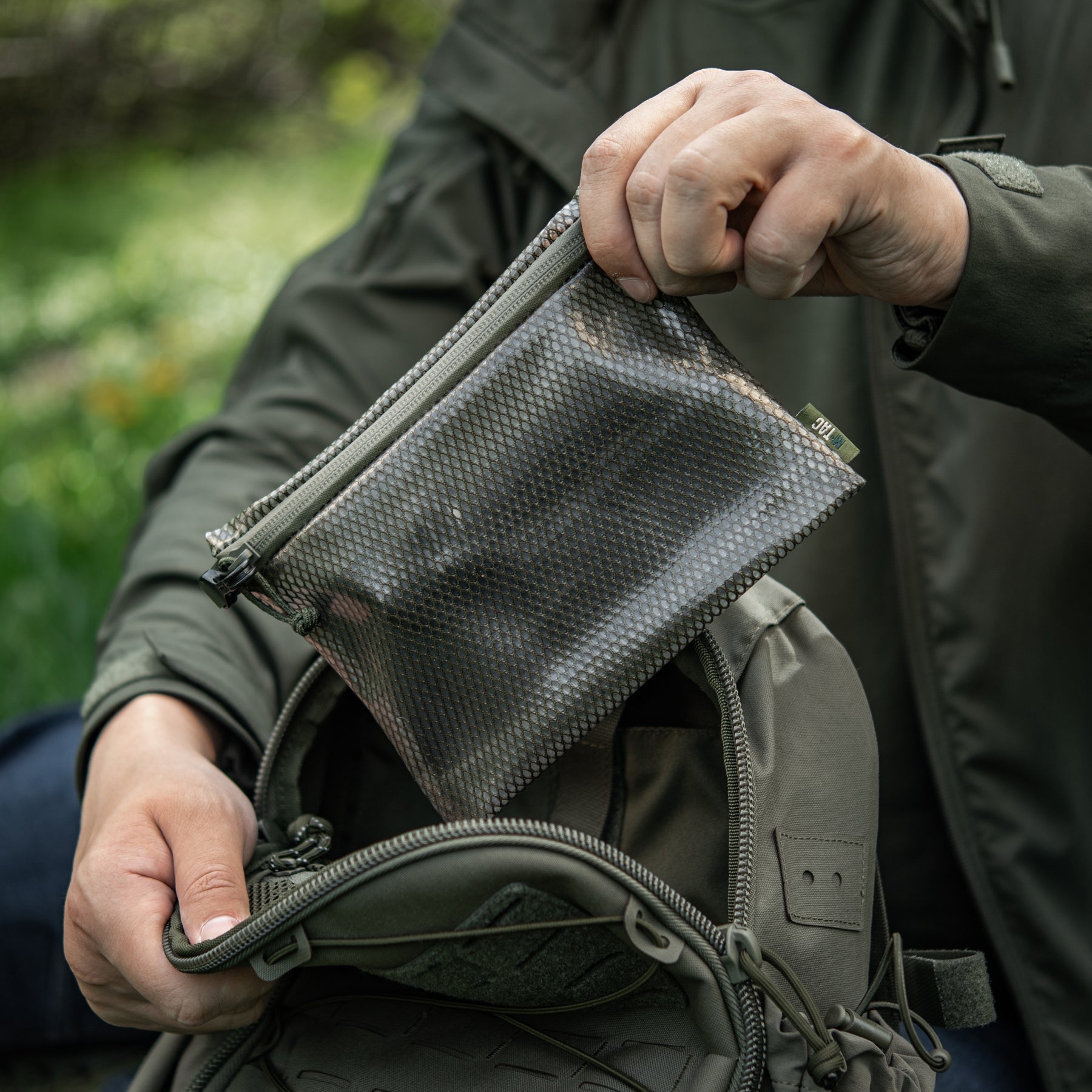 M-Tac Zip Pocket Organizer Set Elite in ranger green, featuring multiple compartments for efficient storage and organization.