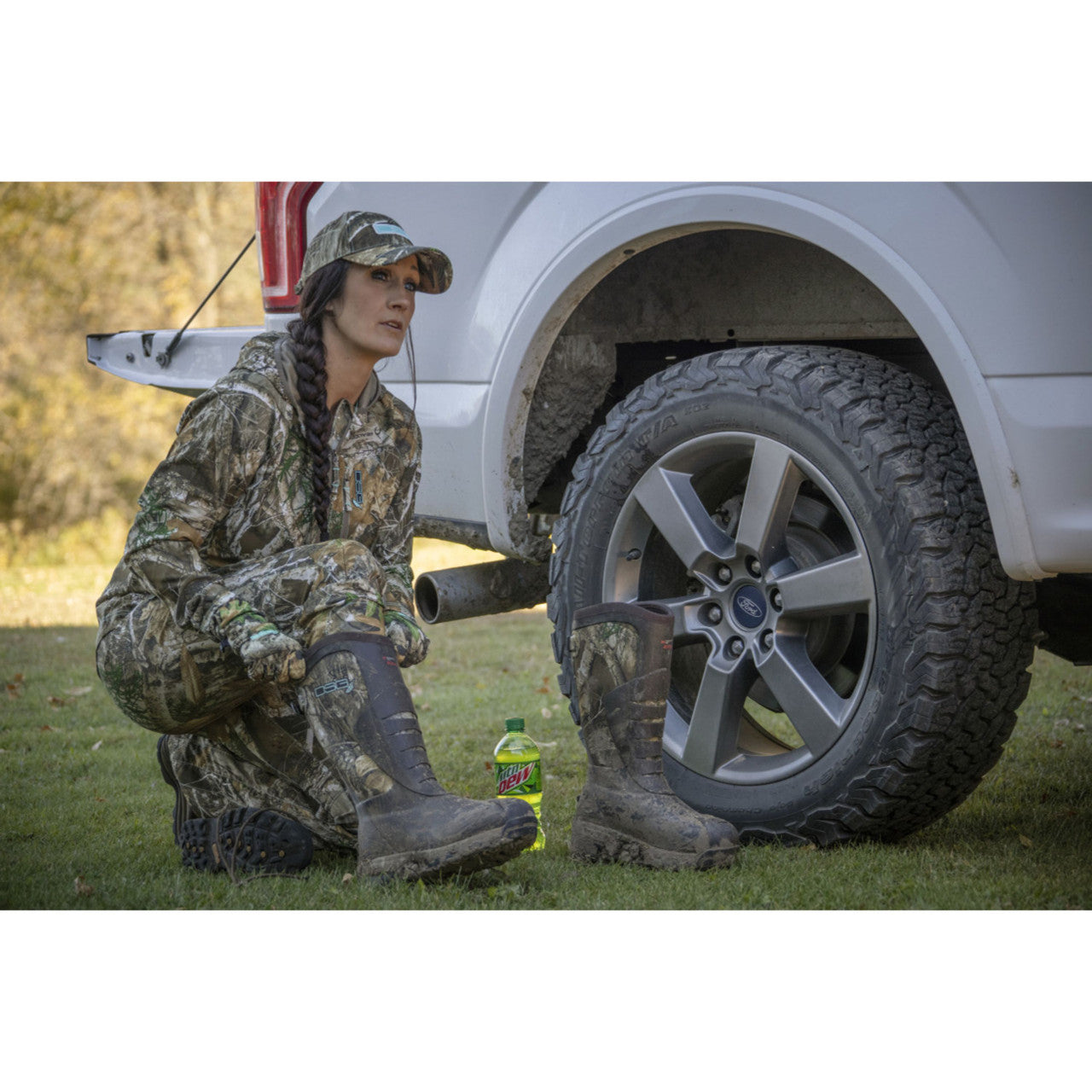 DSG Outerwear rubber boot with 400 gram insulation, waterproof design, and sturdy sole for outdoor wear.