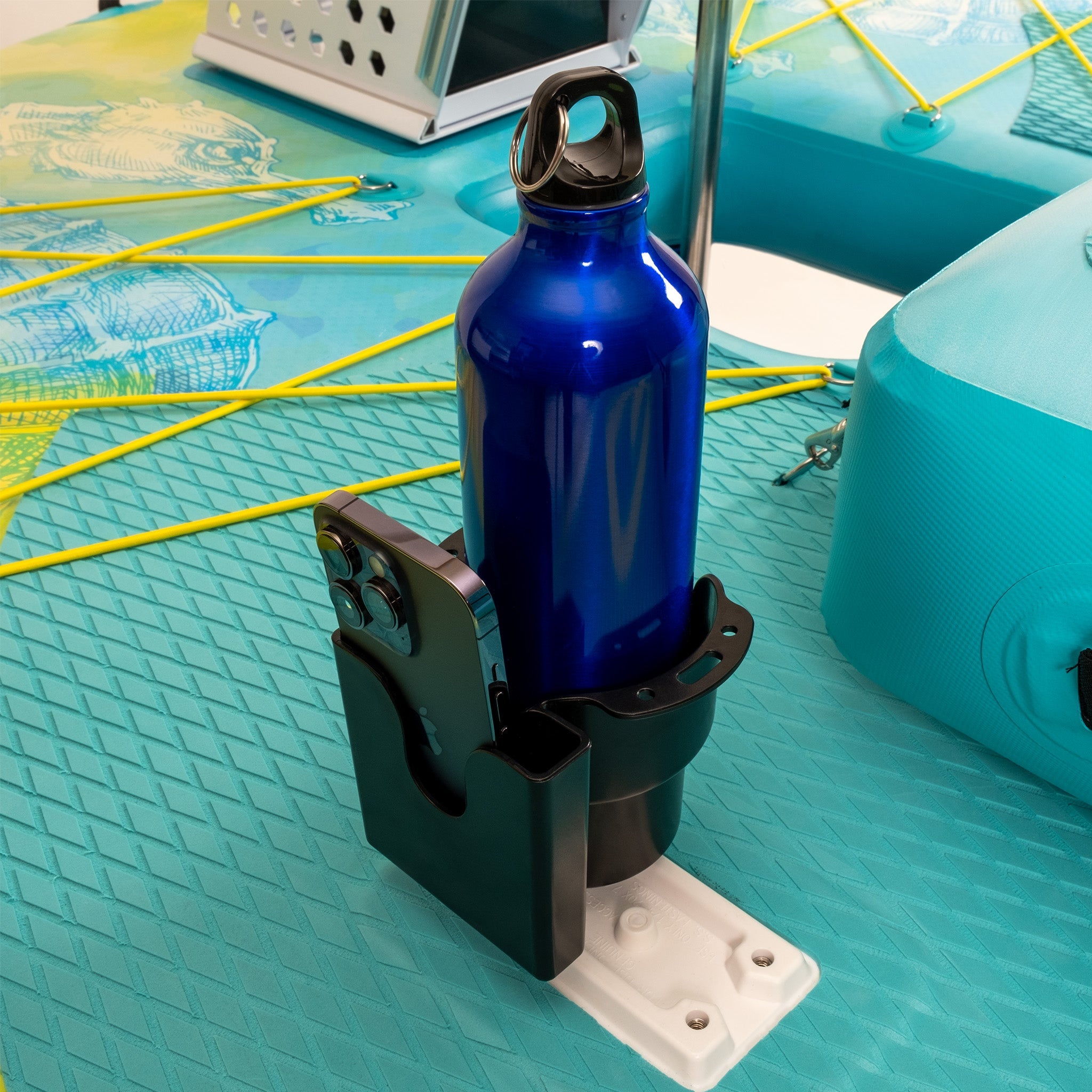 GoBoat MultiCup Phone & Cup Holder securely holding a smartphone and beverage cup, mounted on a boat for convenience.