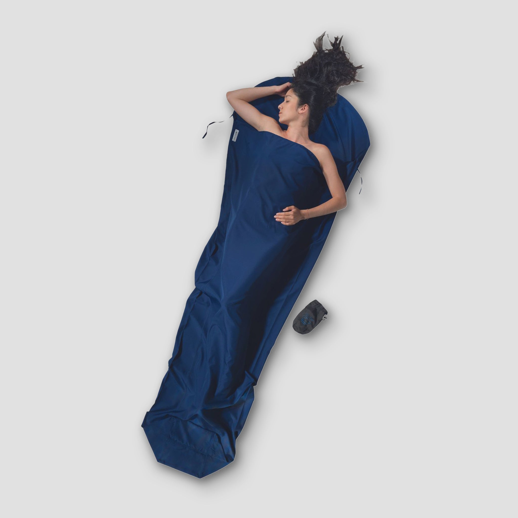 COCOON MummyLiner™ microfiber sleeping bag liner shown in soft, lightweight microfiber material with a neutral color.