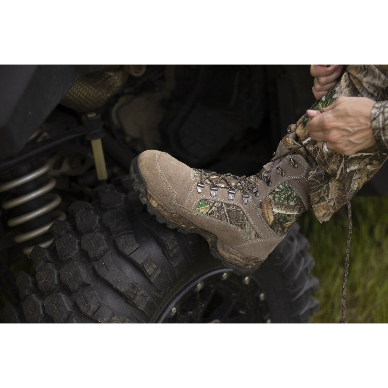 Realtree Edge lace-up hunting boots with 600 grams insulation by DSG Outerwear, featuring rugged design and waterproof material.