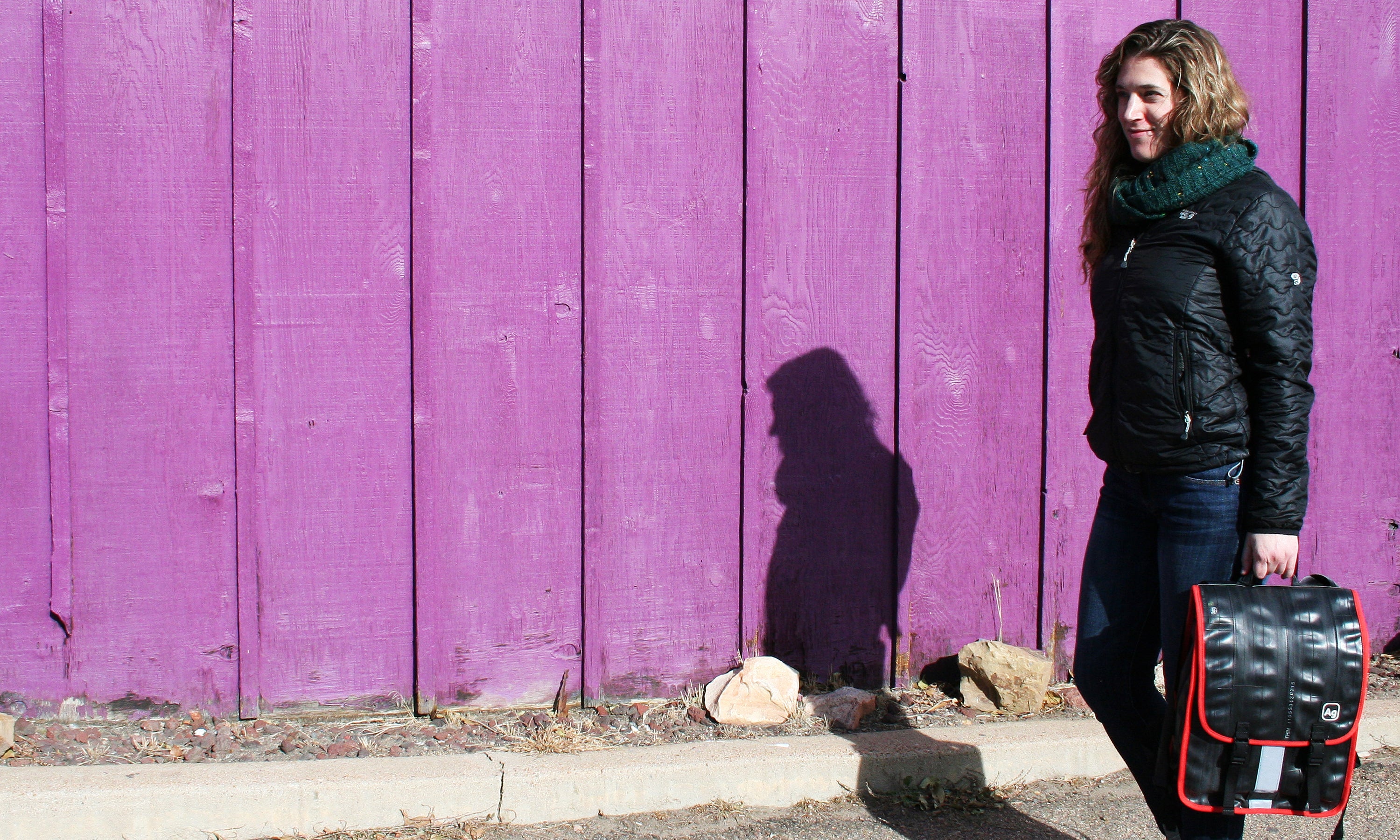 ZEITBIKE Madison Backpack in purple, with a sleek design, shown from the right side against a purple background.