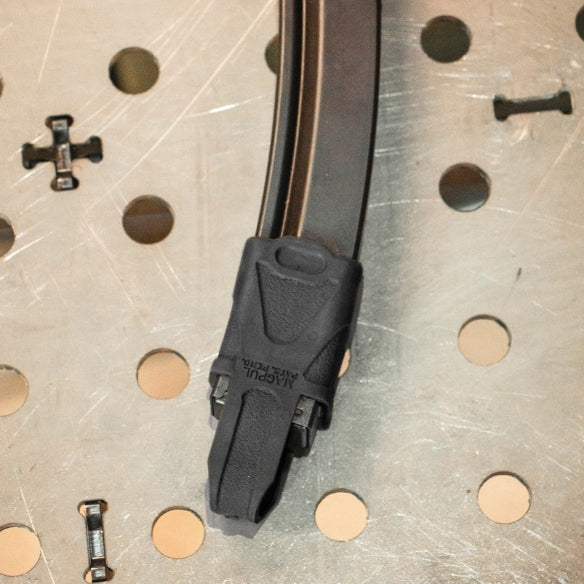Original Magpul 9mm Subgun by HCC Tactical, showcasing tactical gear design and functionality in a sleek profile.