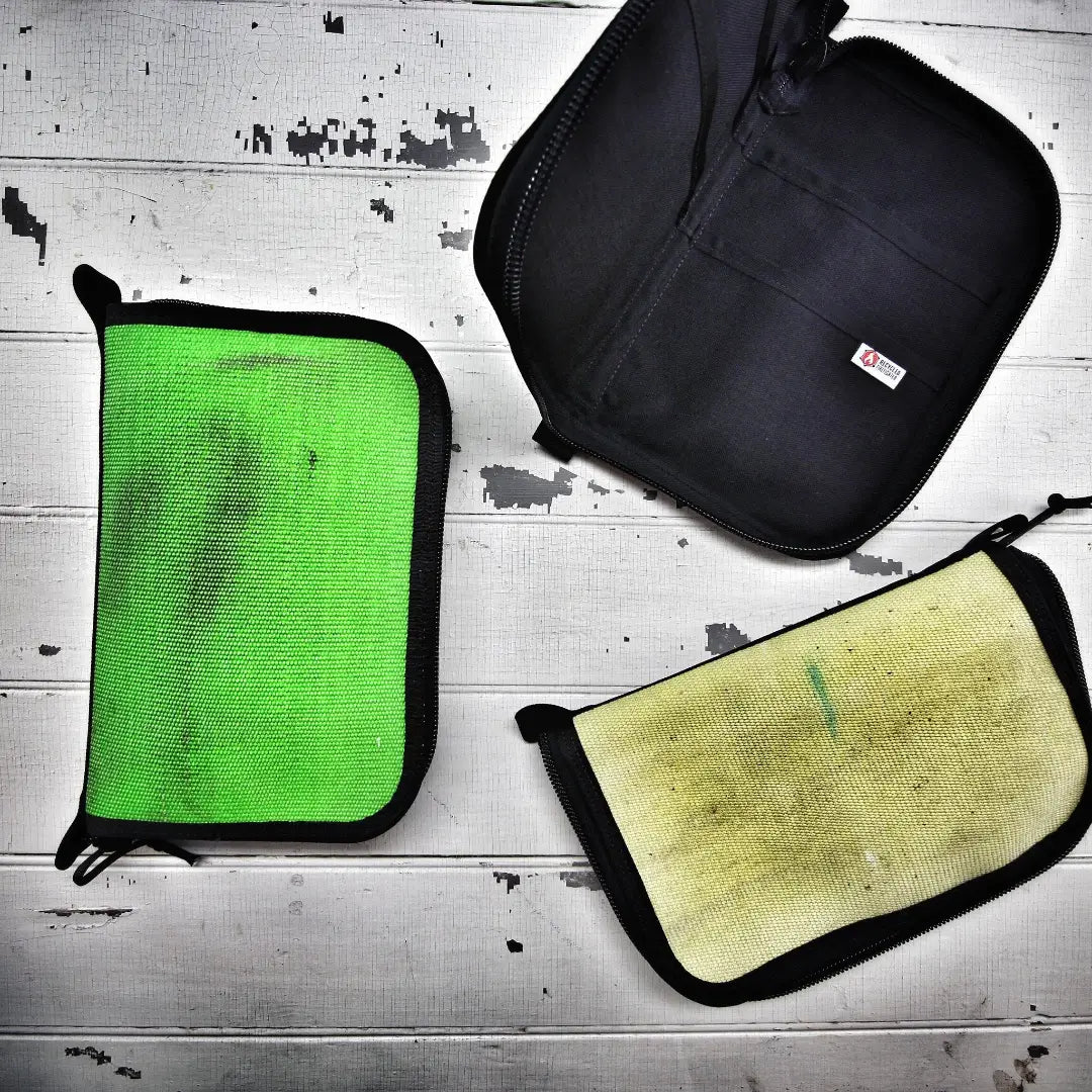 Large Recycled Firefighter Major Dopp Bag in green, yellow, and black with a zippered closure and sturdy handle for travel and storage.