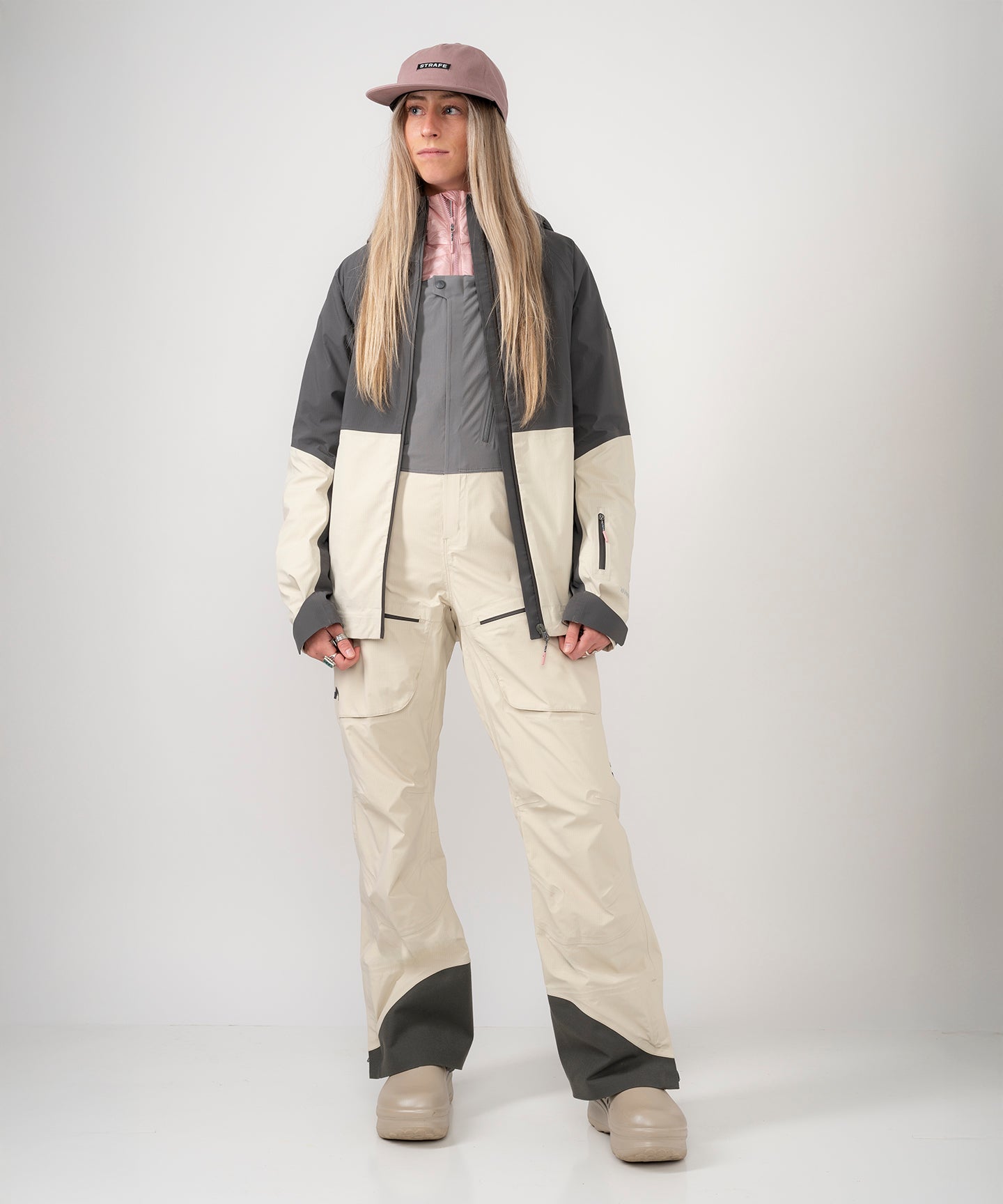 Strafe Outerwear Meadow 3L Shell Jacket in vibrant color, featuring a sleek design and adjustable hood.