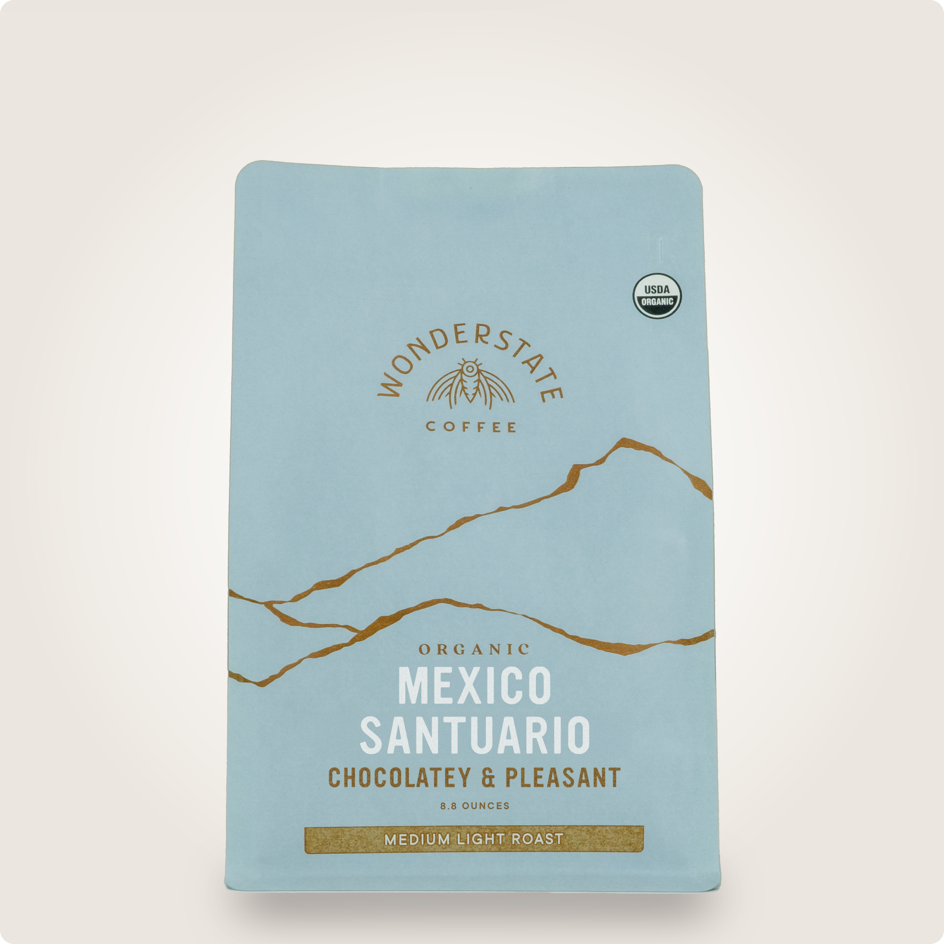Organic Mexico Santuario coffee from Wonderstate Coffee featuring a bag of coffee beans with a natural, rustic label design