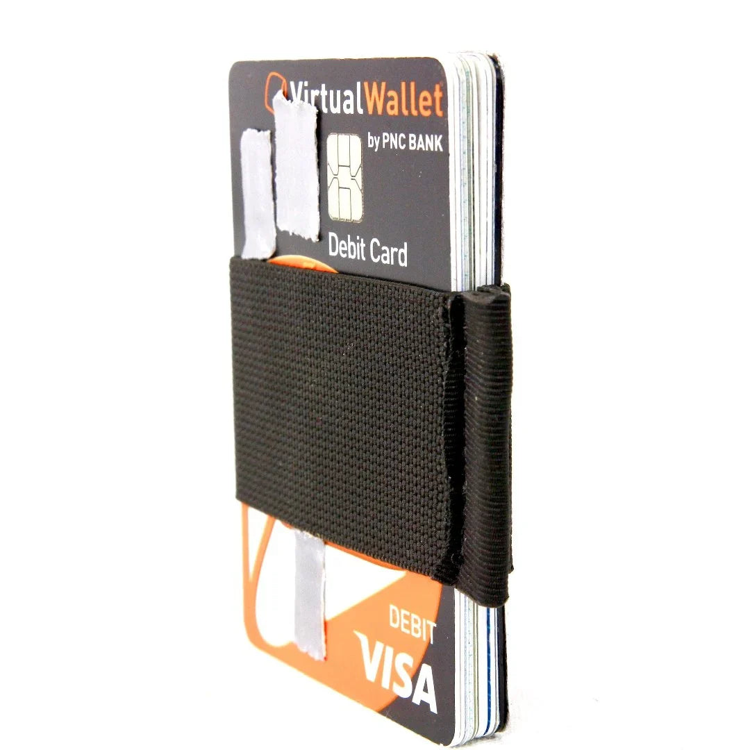 Black minimalist elastic card band wallet by Recycled Firefighter with a sleek design and compact fit for cards and cash.