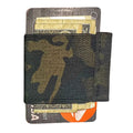 Recycled Firefighter minimalist elastic card band wallet with multicam black design, compact and slim for carrying cards.