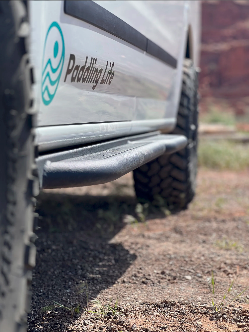 Avatar Offroad NV3500 RockBody Side Steps installed on vehicle, showcasing durable side step design for easy access and rugged style.