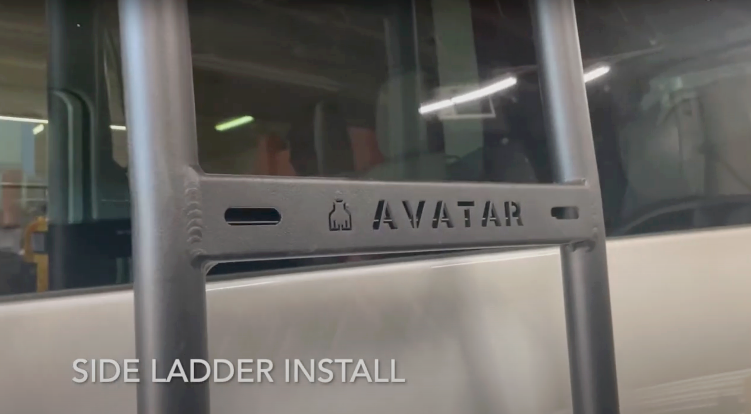 Avatar Offroad NV3500 side ladder attached to vehicle for easy roof access, durable metal construction with safety features.